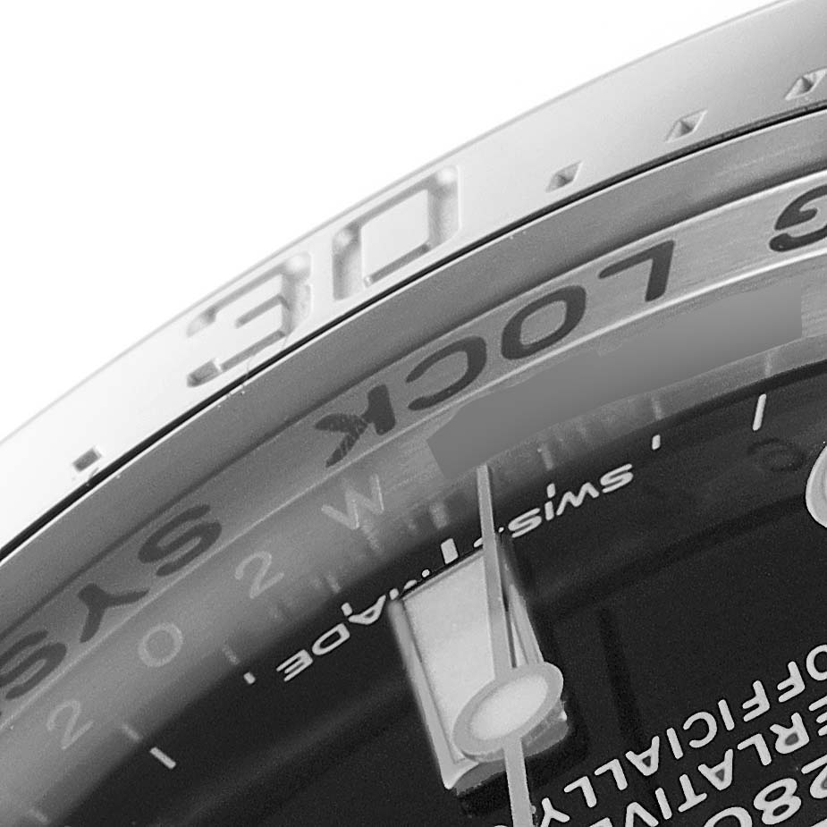 This image shows a close-up of the bezel, part of the dial, and the text on a Rolex Sea-Dweller 116660 Men
s Stainless Steel Blue Dial 116660 Men
s Stainless Steel Blue Dial watch at an angled perspective.