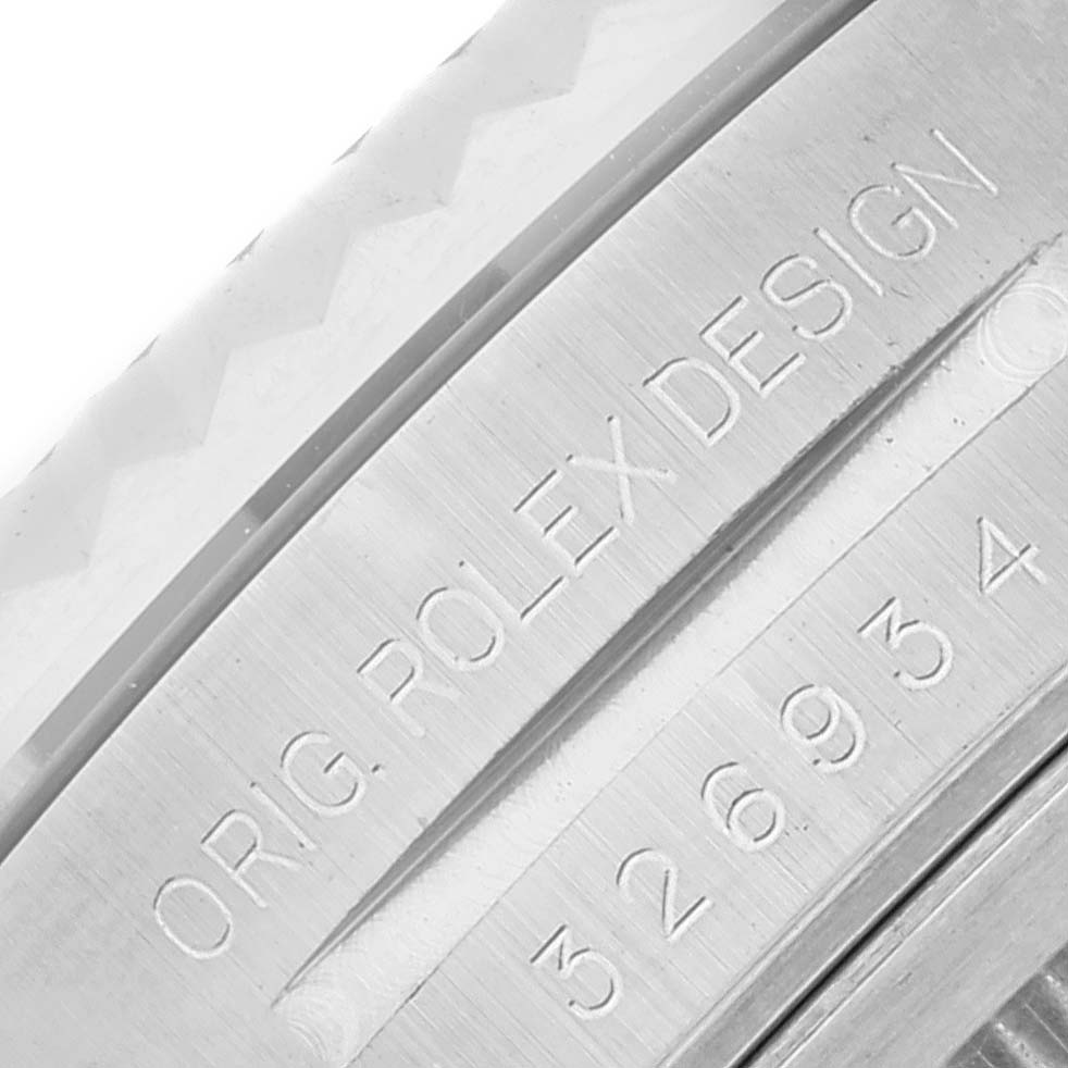 This close-up image shows the engraved branding and model information on the side of the Rolex Sky-Dweller 326934 Men
s Stainless Steel Black Dial 326934 Men
s Stainless Steel Black Dial watch.