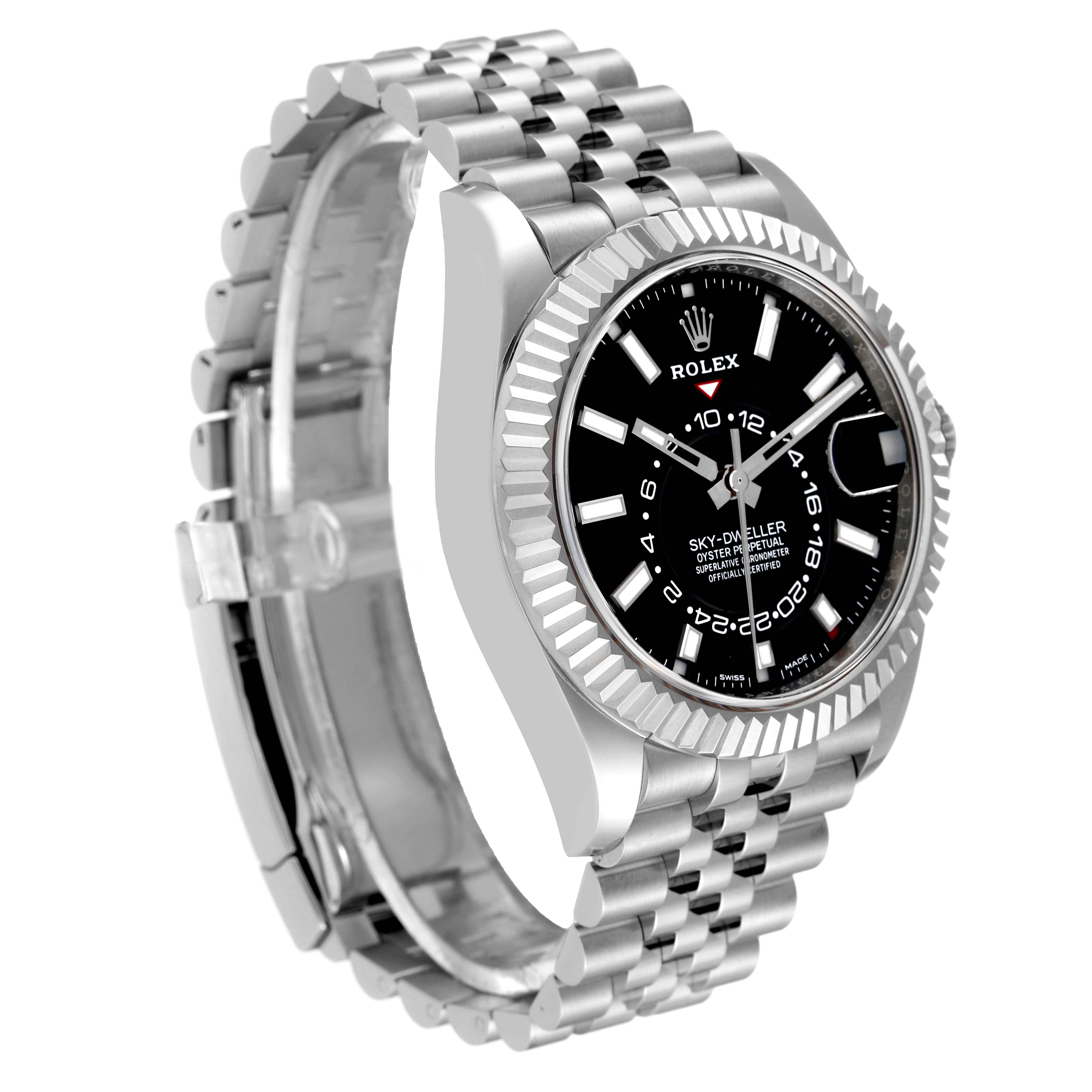 The image shows a side angle of a Rolex Sky-Dweller 326934 Men
s Stainless Steel Black Dial 326934 Men
s Stainless Steel Black Dial watch, highlighting the bezel, dial, and bracelet.