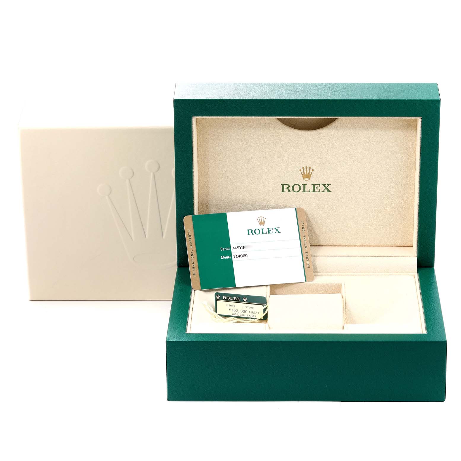 The image shows the open box of a Rolex Submariner 114060 Men
s Stainless Steel Black Dial 114060 Men
s Stainless Steel Black Dial model, featuring a warranty card and tags, viewed from an eye-level angle.