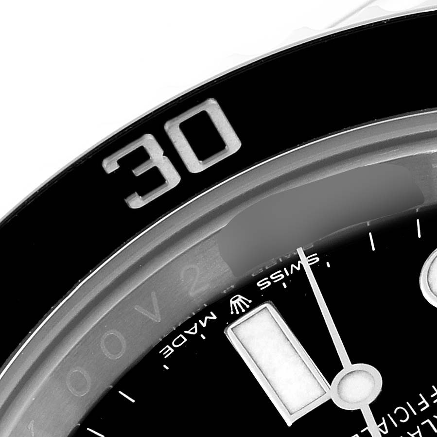 This image shows a close-up of the bezel and part of the dial on a Rolex Submariner 126610 Men
s Stainless Steel Black Dial 126610 Men
s Stainless Steel Black Dial watch, highlighting the "30" minute mark.