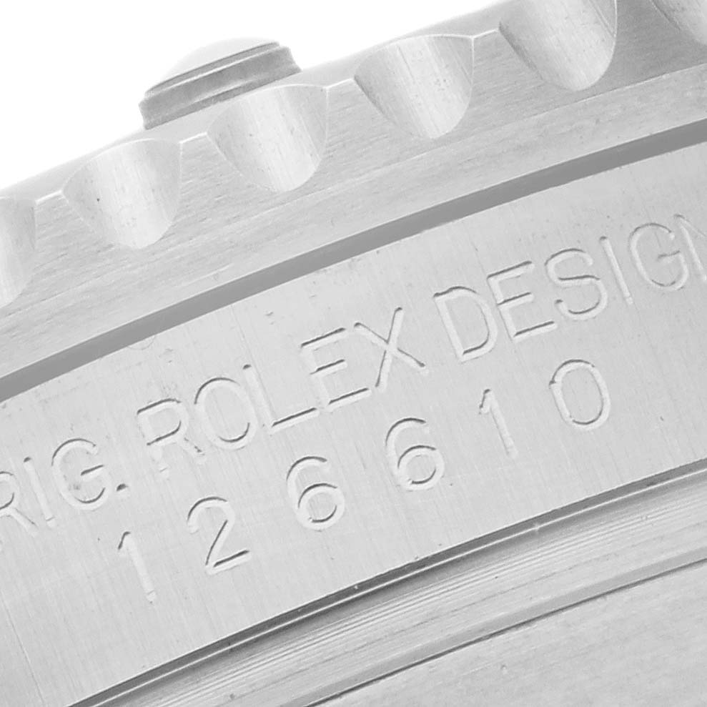 This close-up image shows the engraved design number on the case of a Rolex Submariner 126610 Men
s Stainless Steel Black Dial 126610 Men
s Stainless Steel Black Dial watch.