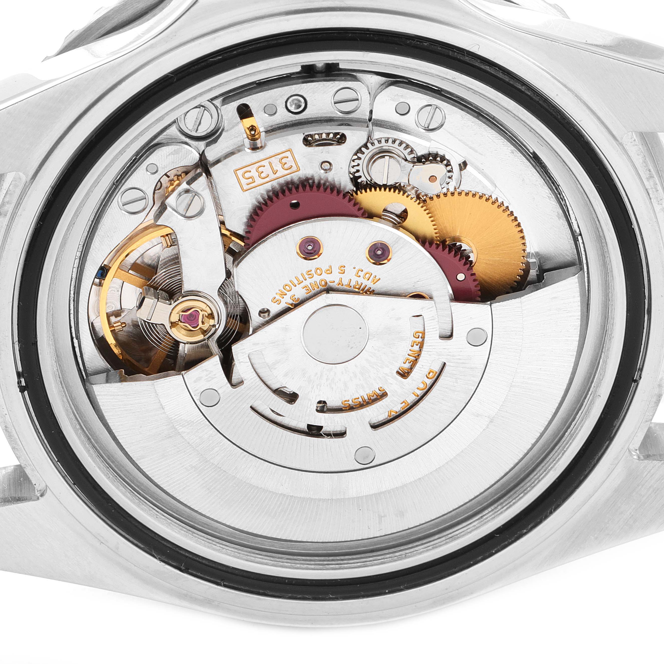 This image shows the intricate internal mechanics and movement of a Rolex Submariner 16610 Men
s Stainless Steel Black Dial 16610 Men
s Stainless Steel Black Dial watch from a back angle.