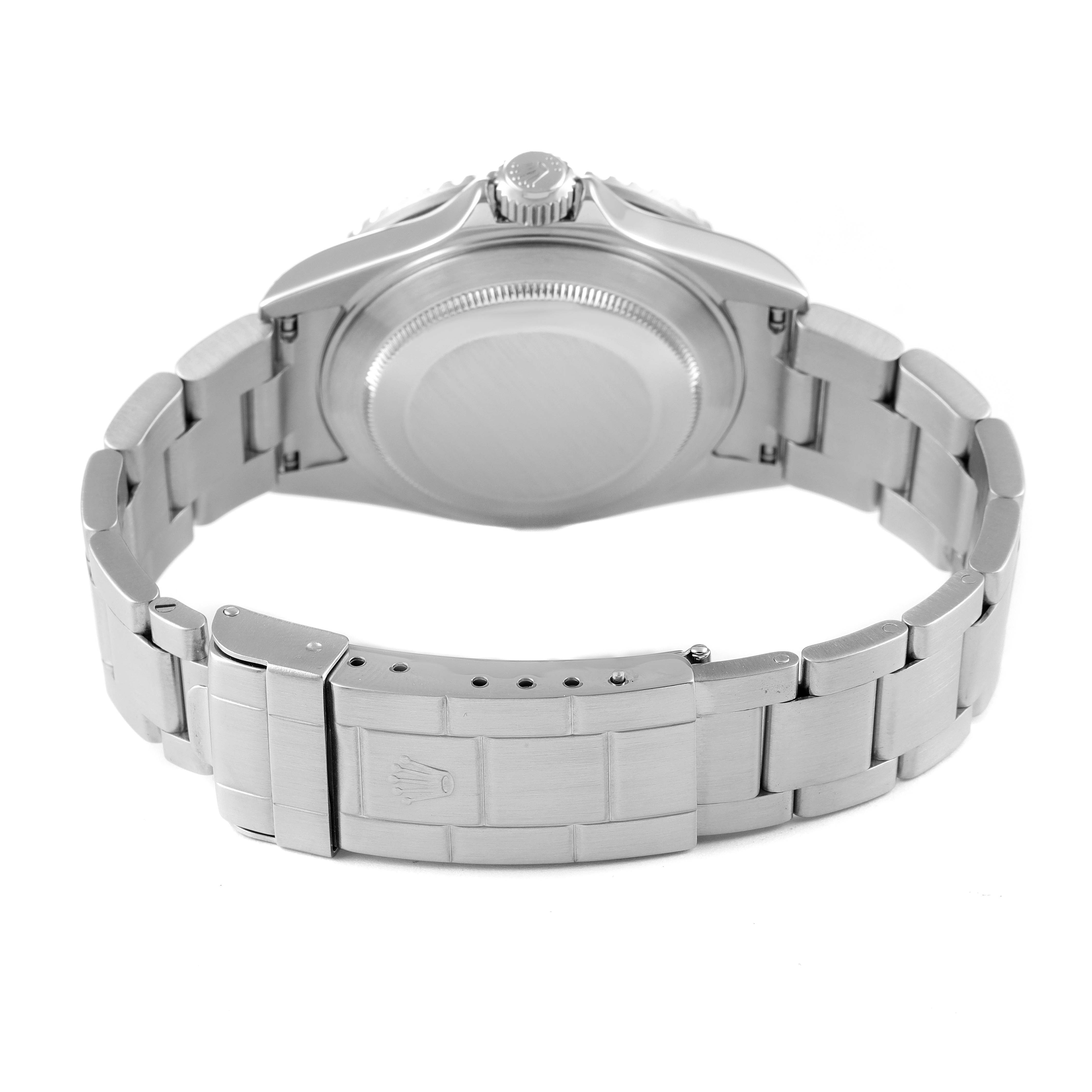 The image shows the back case and bracelet of a Rolex Submariner 16610 Men
s Stainless Steel Black Dial 16610 Men
s Stainless Steel Black Dial watch from a rear angle.