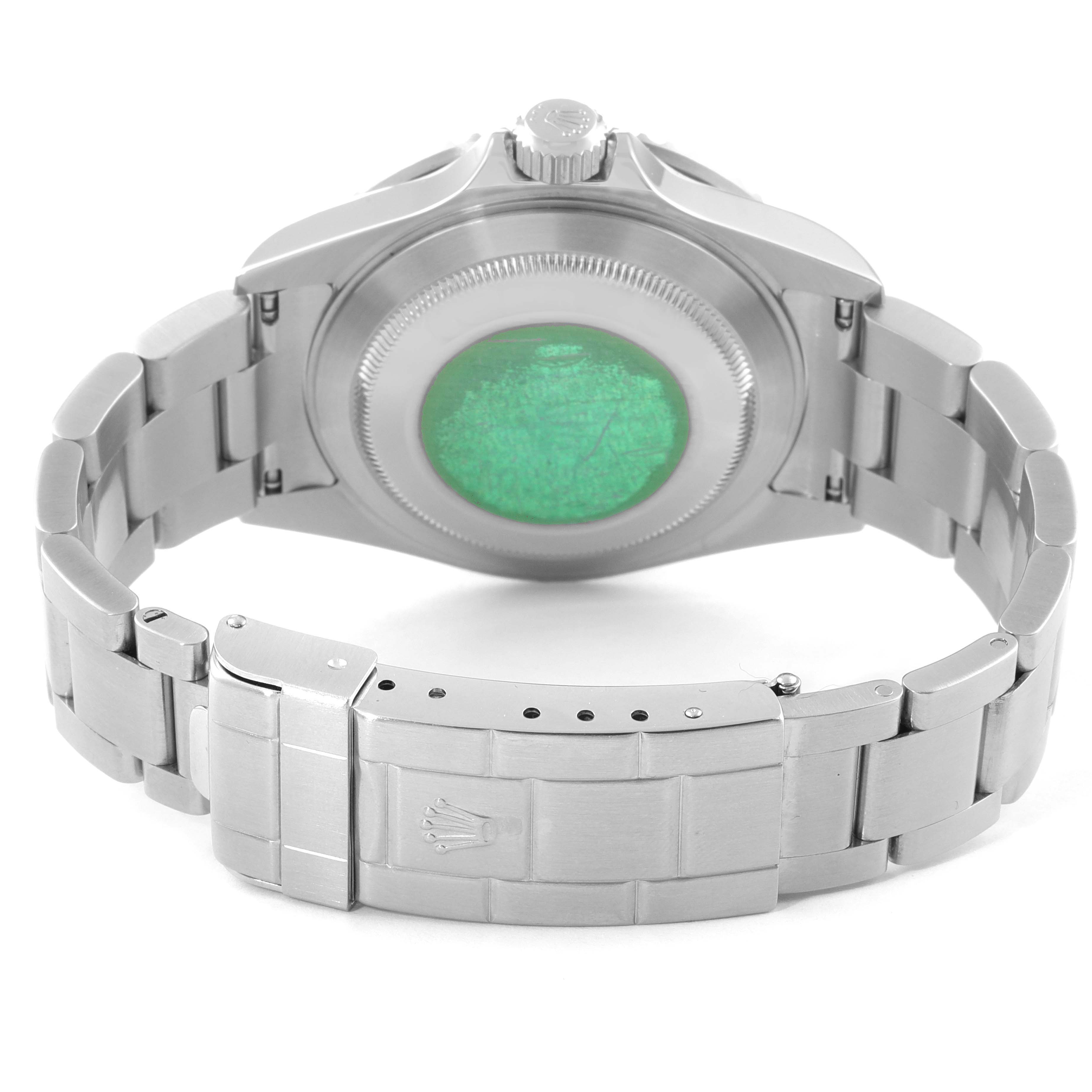 The image shows the back view of a Rolex Submariner 16610 Men
s Stainless Steel Black Dial 16610 Men
s Stainless Steel Black Dial watch, focusing on its case back and bracelet clasp.