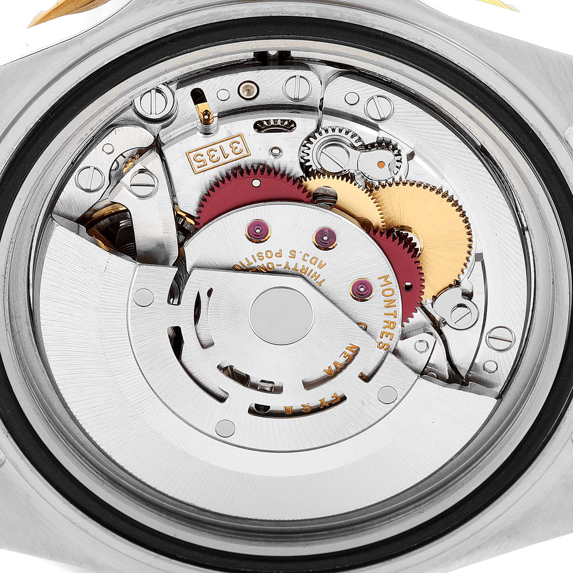 This is a close-up view of the internal movement mechanism of a Rolex Submariner 16613 Men
s Steel and Gold (two tone) Blue Dial 16613 Men
s Steel and Gold (two tone) Blue Dial watch.