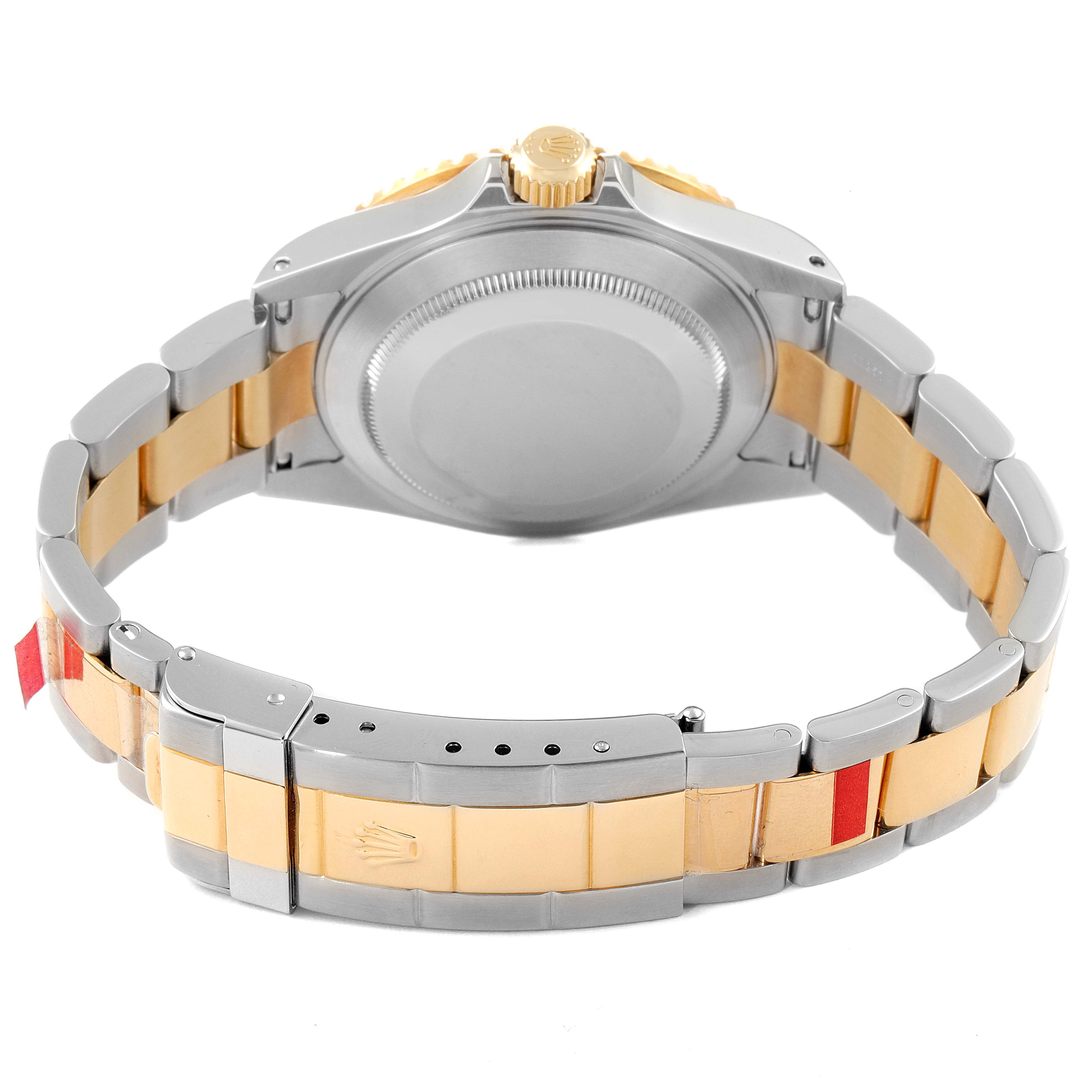 The image shows the back and partial bracelet of a Rolex Submariner 16613 Men
s Steel and Gold (two tone) Blue Dial 16613 Men
s Steel and Gold (two tone) Blue Dial watch at a rear angle.