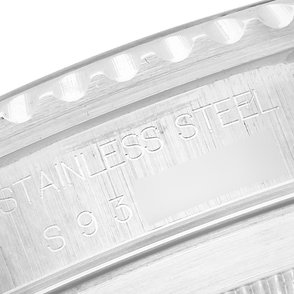 The image shows a close-up of the stainless steel case back and edge of a Rolex Submariner 14060 Men's Stainless Steel Black Dial 14060 Men's Stainless Steel Black Dial, highlighting the engraved text.