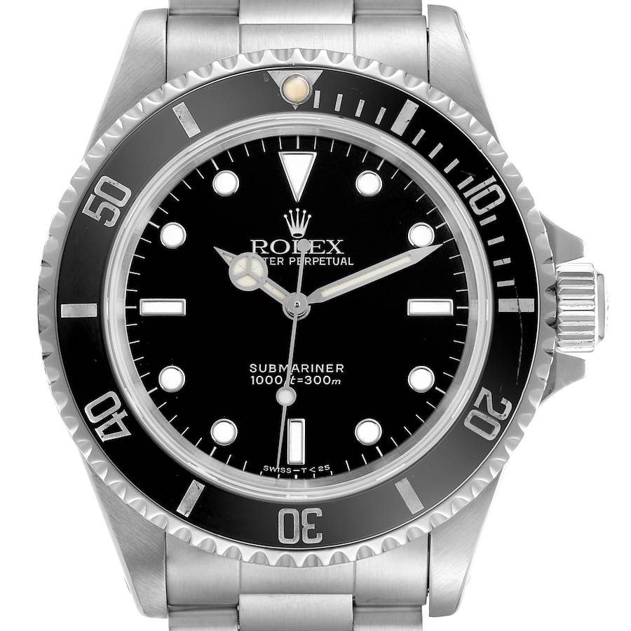 The Rolex Submariner is shown from the front, displaying the dial, bezel, and part of the bracelet.