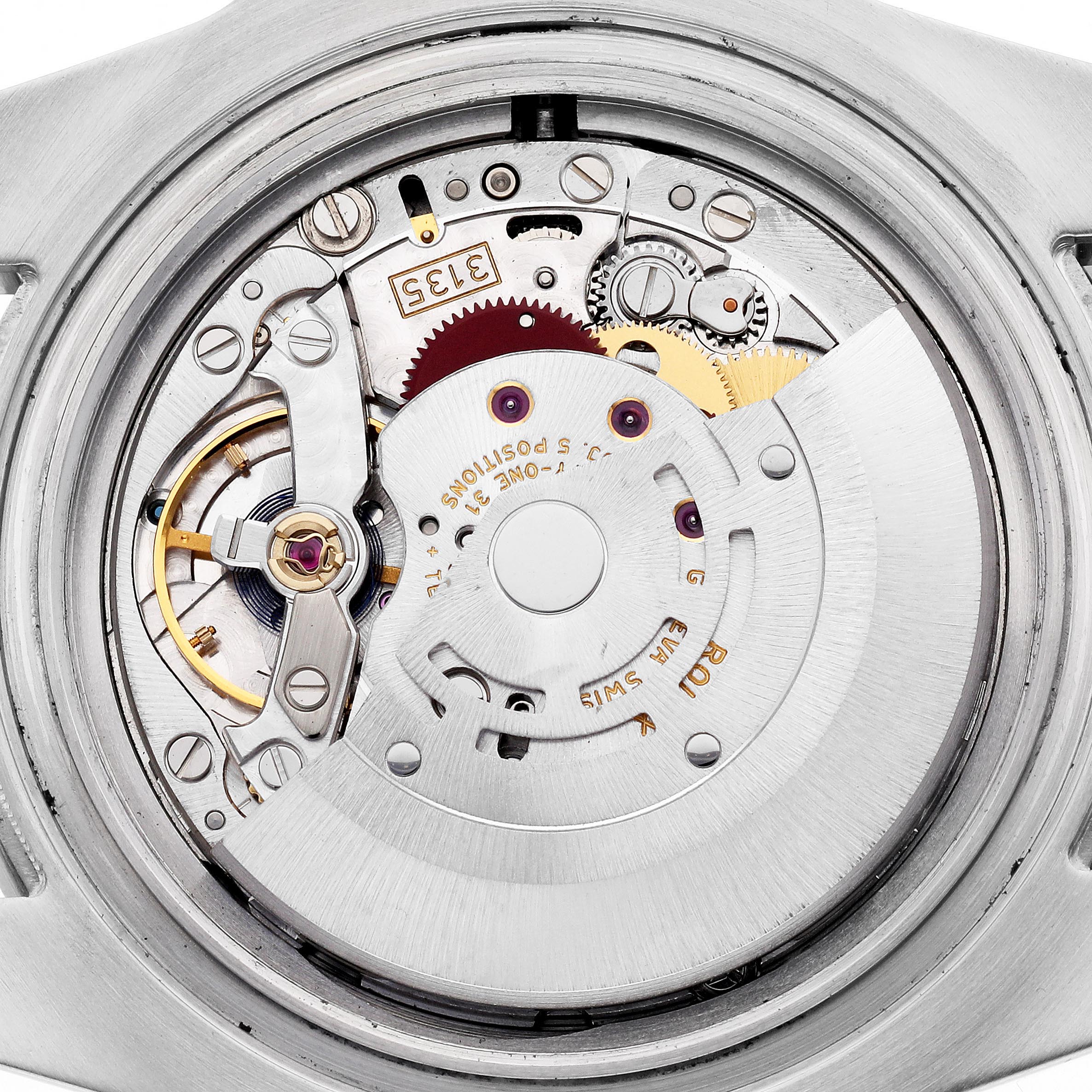 The image shows the internal movement of a Rolex Submariner 116613 Men's Steel and Gold (two tone) Black Dial 116613 Men's Steel and Gold (two tone) Black Dial watch from a rear angle, highlighting gears and the rotor.