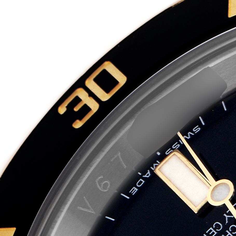 The image shows a close-up of a Rolex Submariner 116613 Men's Steel and Gold (two tone) Black Dial 116613 Men's Steel and Gold (two tone) Black Dial watch, highlighting the bezel, dial, and part of a hand with a "30" marking.