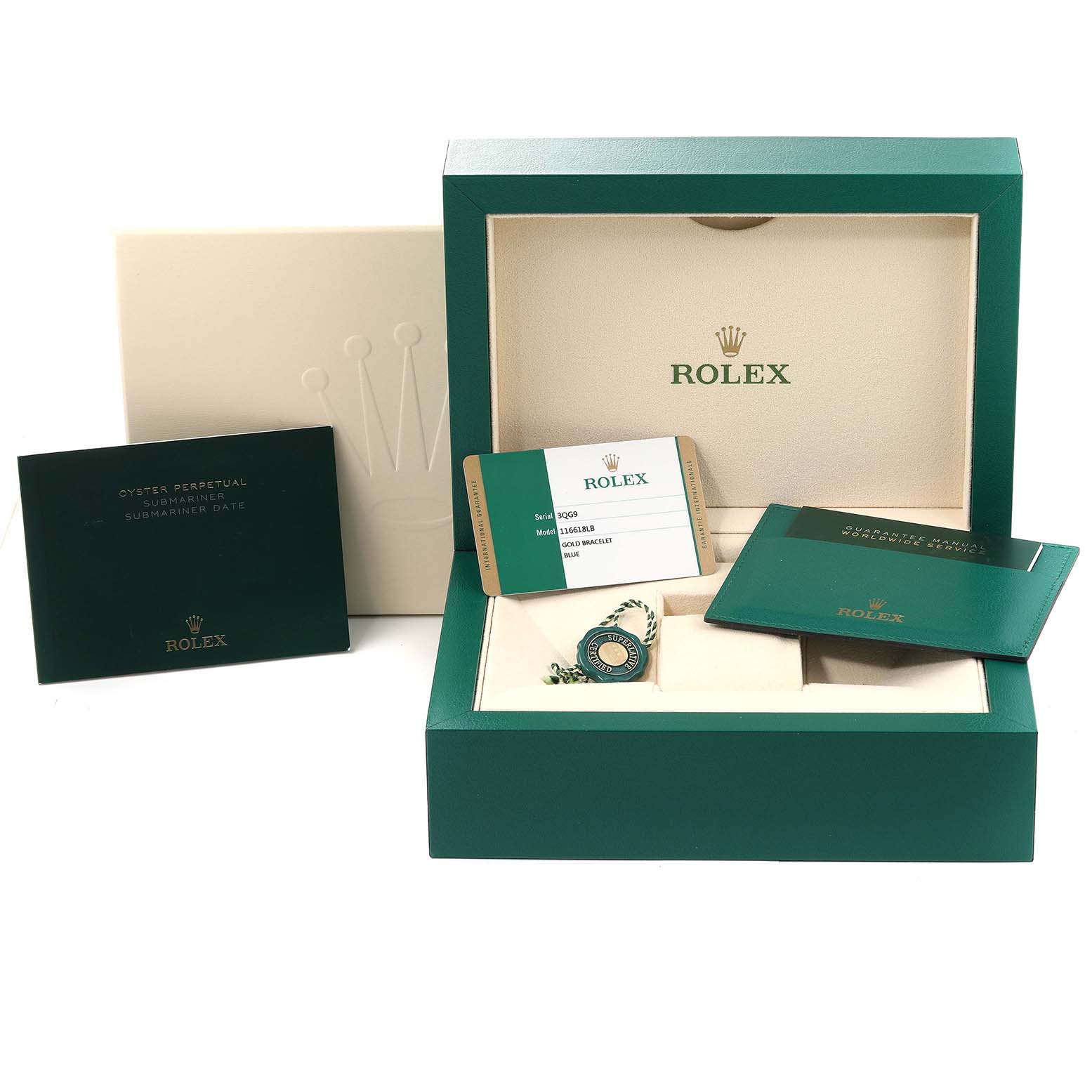The image shows the packaging and accessories for a Rolex Submariner 116618 Men's Yellow Gold Blue Dial 116618 Men's Yellow Gold Blue Dial watch, including manuals, warranty card, and box.