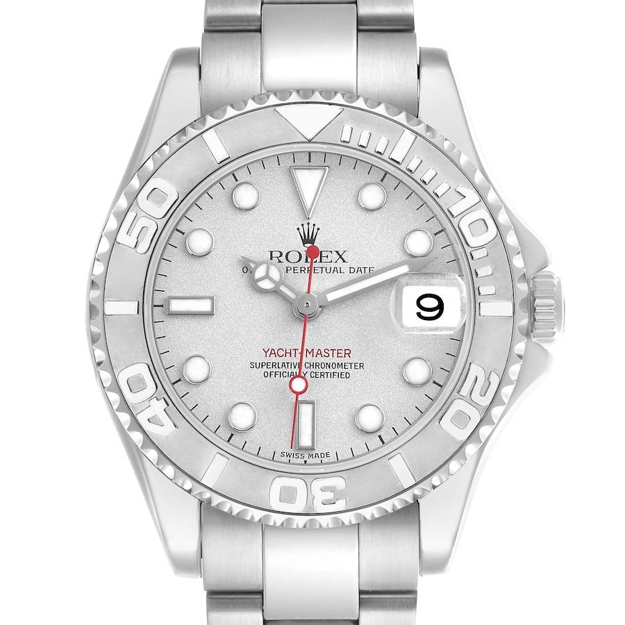 The Rolex Yacht-Master watch is shown from a top-down angle, displaying its face, bezel, and part of the bracelet.