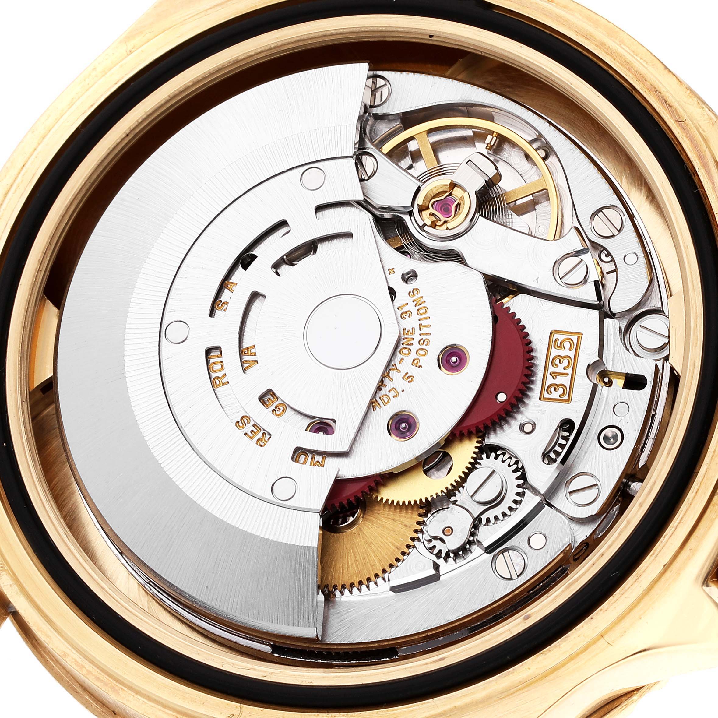 This image shows the internal movement mechanism of a Rolex Yacht-Master 16628 Men's Yellow Gold White Dial 16628 Men's Yellow Gold White Dial watch viewed from the back.