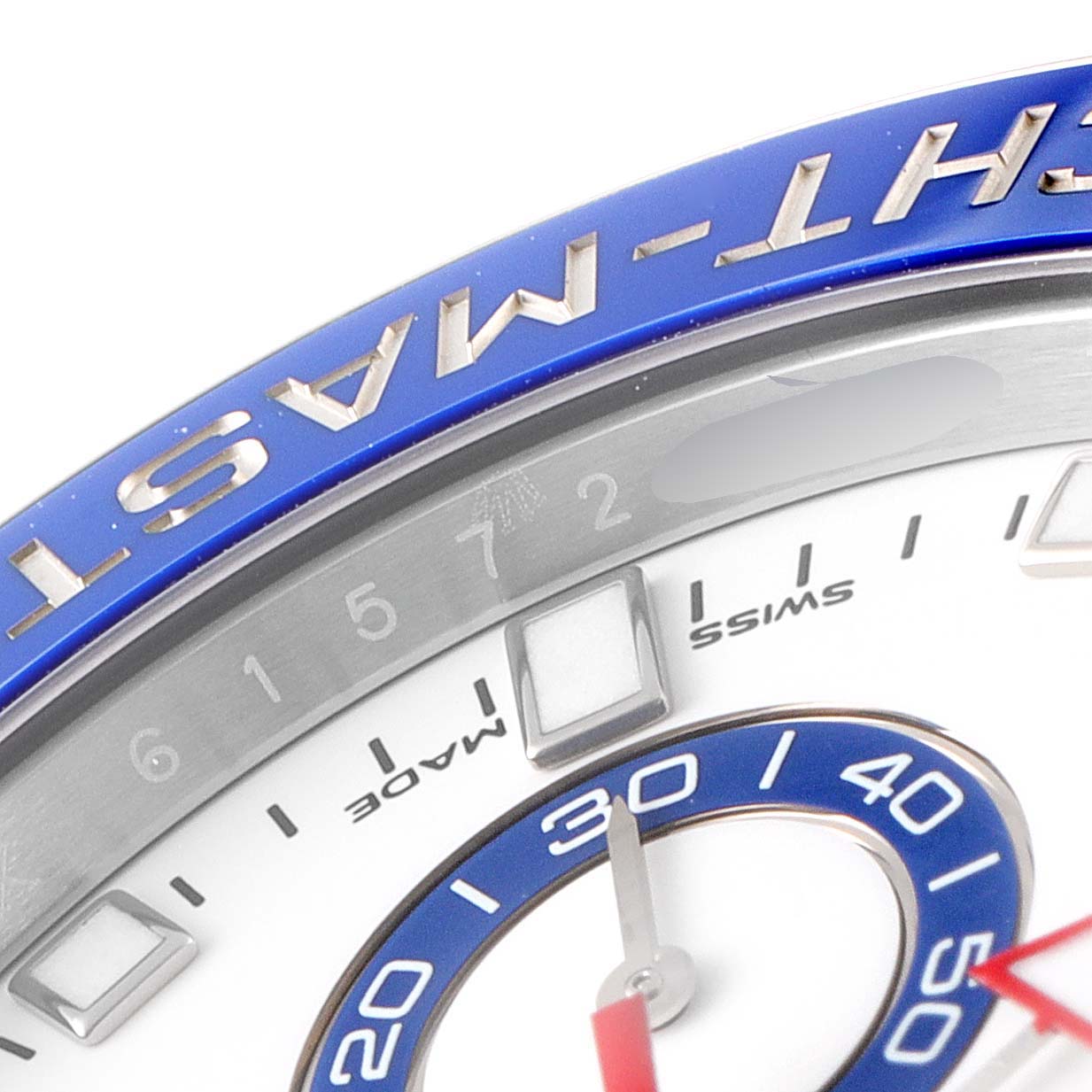 The image shows a close-up of the dial and blue bezel of a Rolex Yacht-Master 116680 Men
s Stainless Steel White Dial 116680 Men
s Stainless Steel White Dial watch.