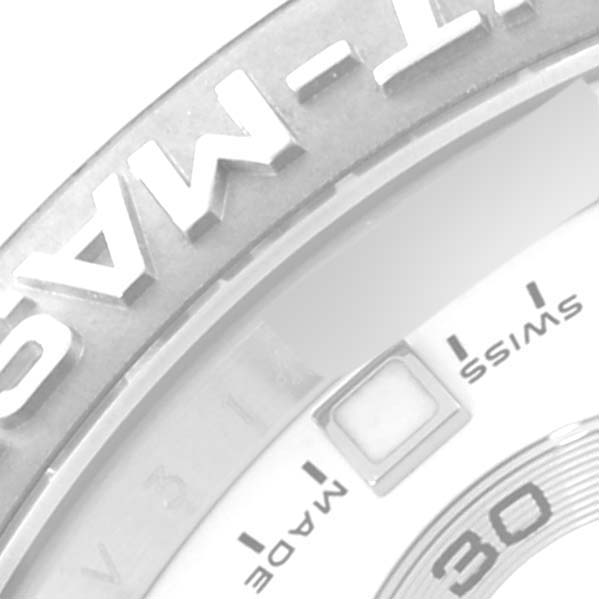 The image shows a close-up angle of the bezel and part of the dial of a Rolex Yacht-Master 116689 Men's White Gold White Dial 116689 Men's White Gold White Dial watch.
