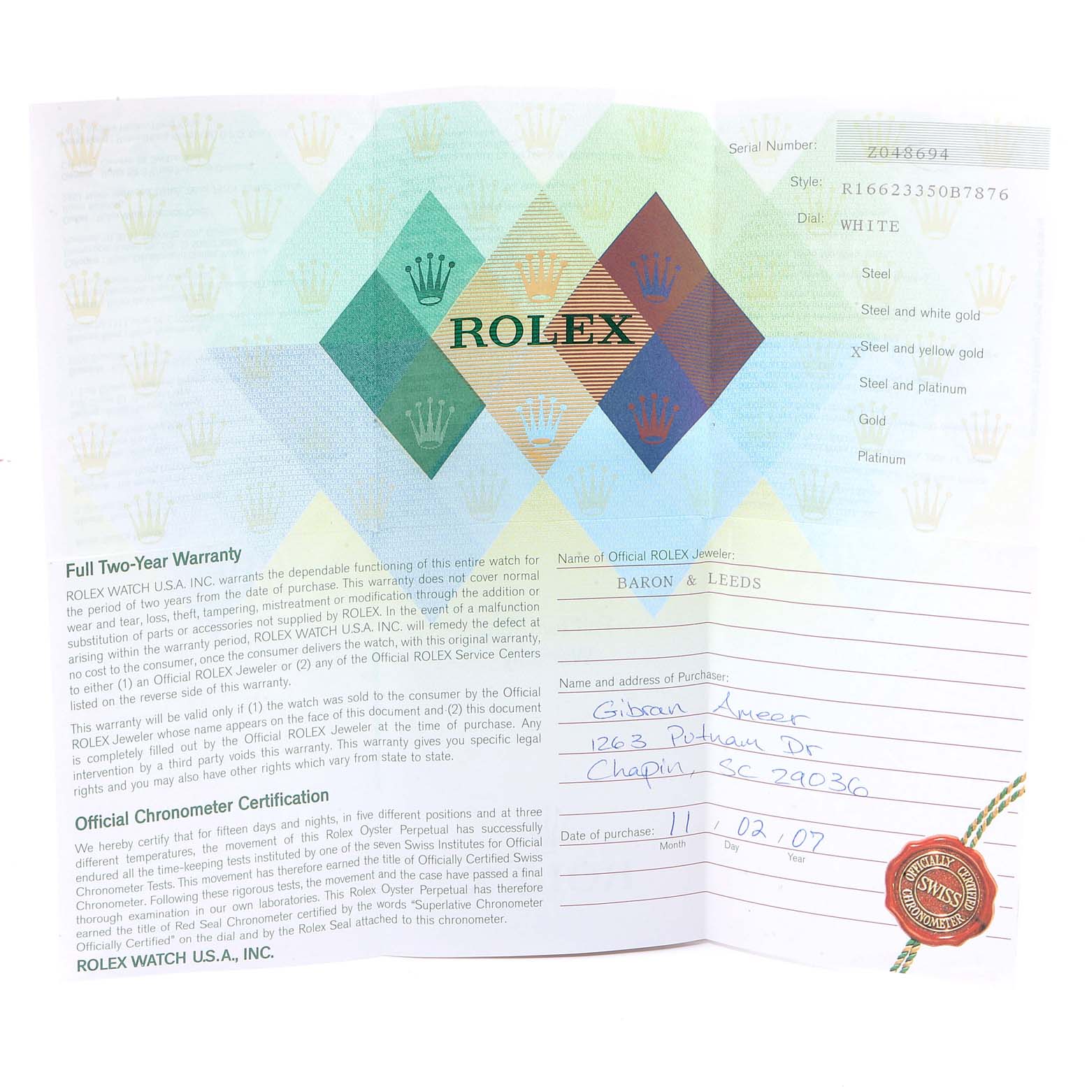 The image shows a flat lay of the warranty card for the Yacht-Master model by Rolex with handwritten purchase information.