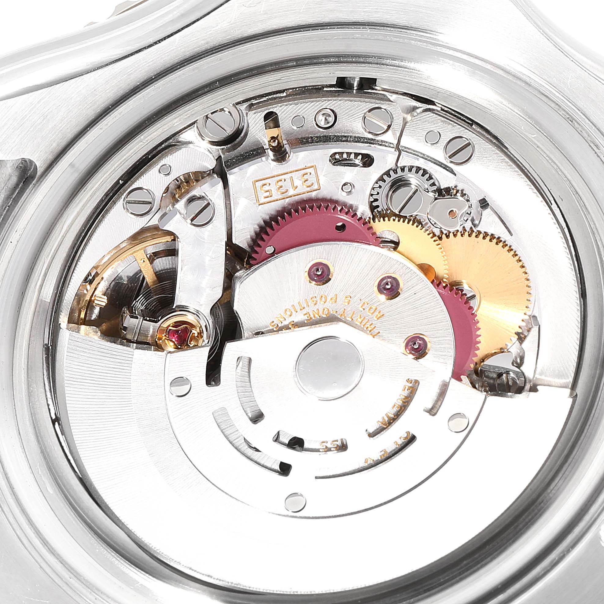 This close-up image shows the intricate internal mechanism of the Rolex Yacht-Master 16623  Men
s Steel and Gold (two tone) White Dial 16623  Men
s Steel and Gold (two tone) White Dial watch.