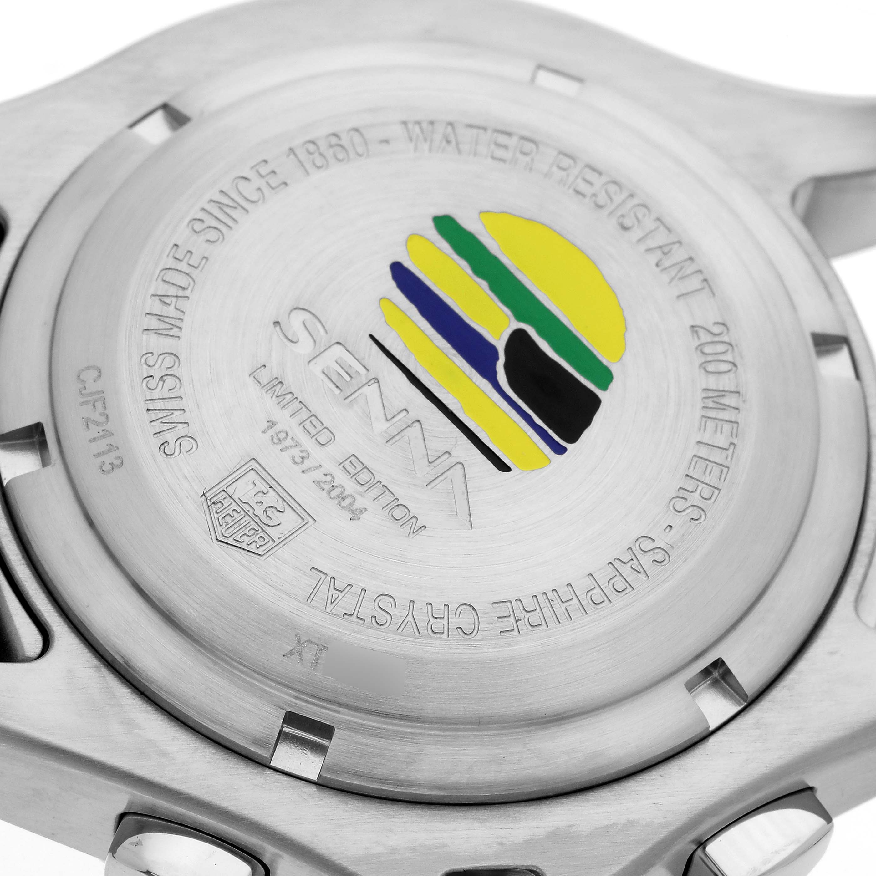 The image shows the case back of the Tag Heuer Senna Limited Edition watch, highlighting the engraved details and logo.