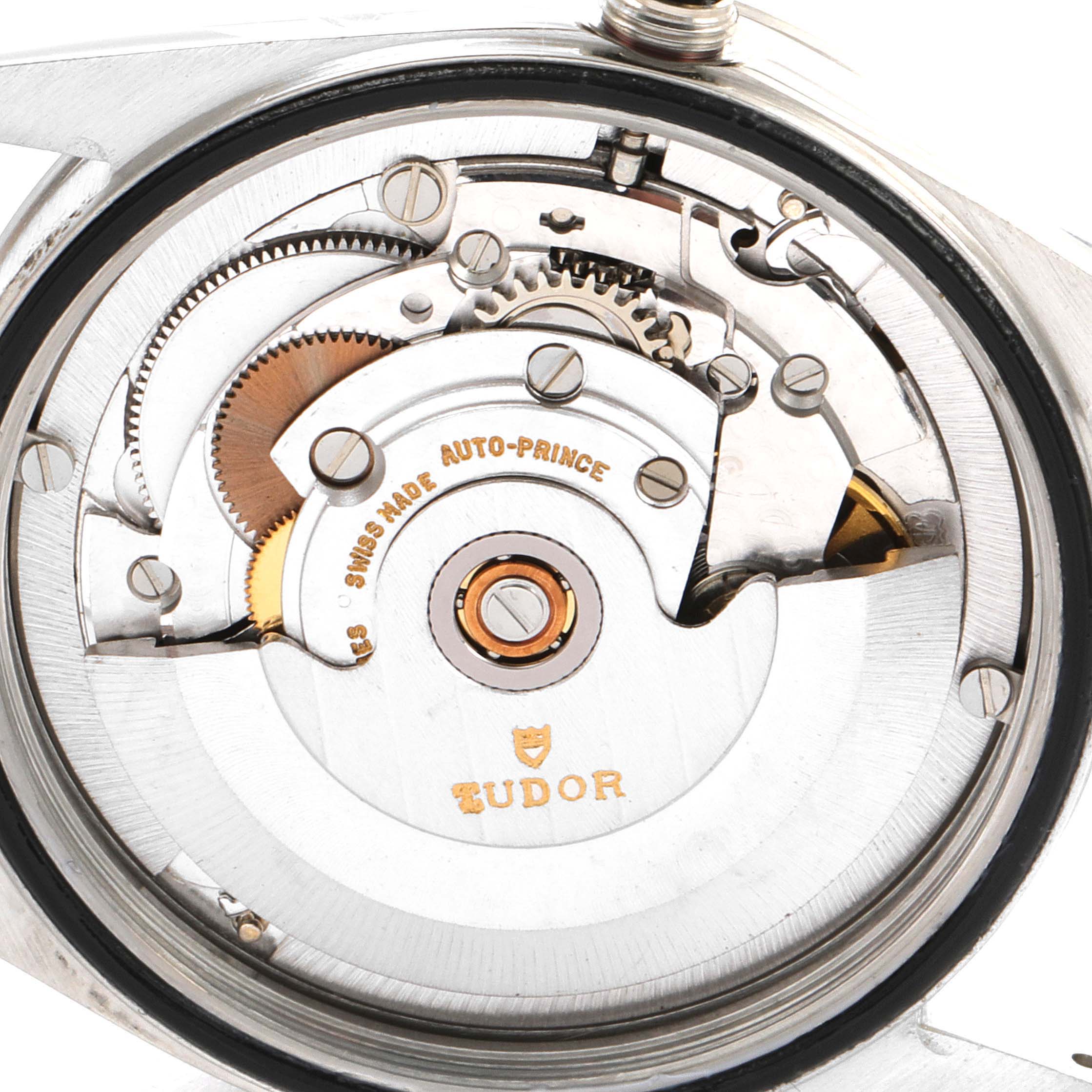 This image shows a close-up of the movement inside the Tudor Prince 94510 Men's Stainless Steel Silver Dial 94510 Men's Stainless Steel Silver Dial watch, highlighting the mechanical parts and gears.