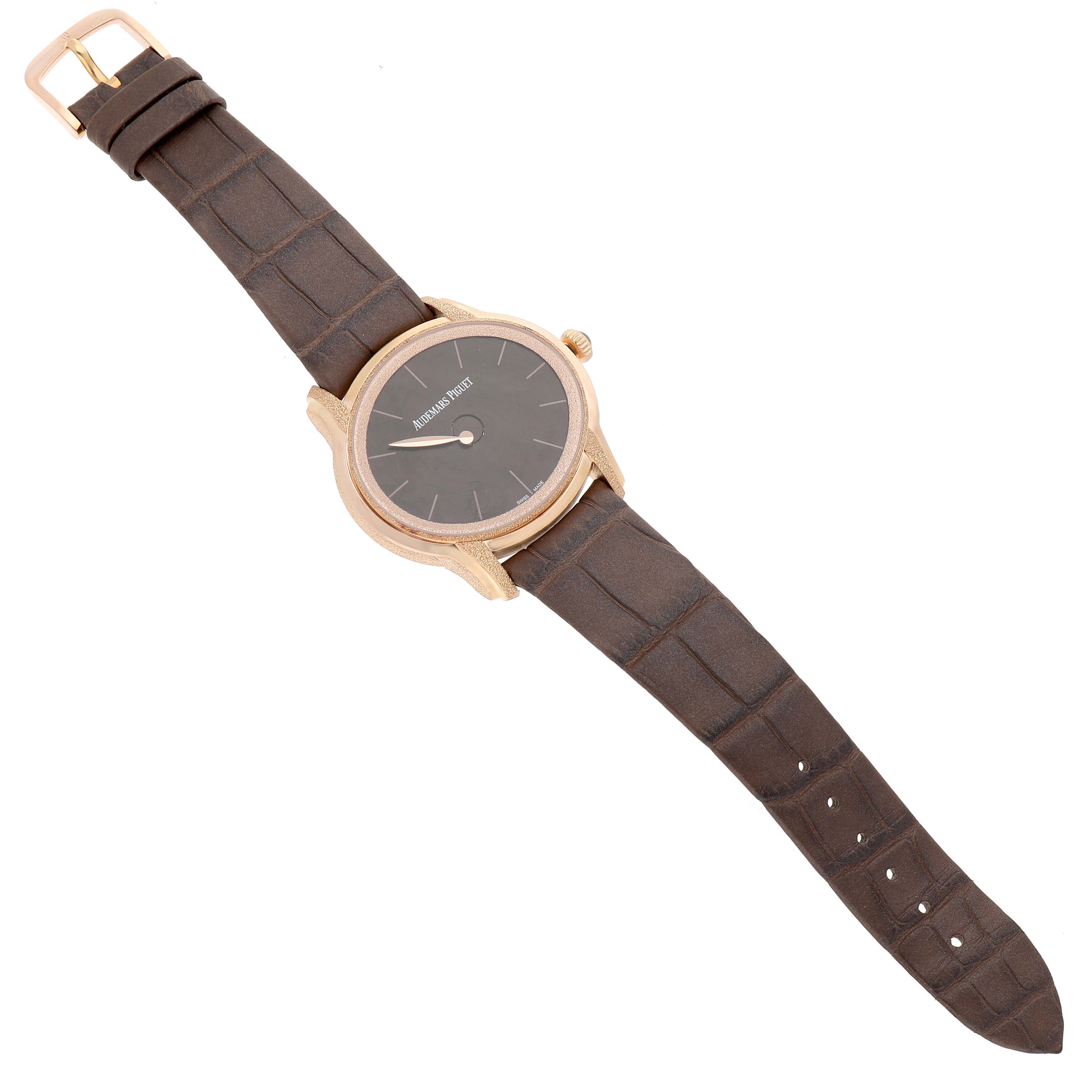 The Audemars Piguet Millenary 77266OR Women's Rose Gold Brown Dial watch is shown from an angled top-down view, highlighting the face, case, strap, and buckle.