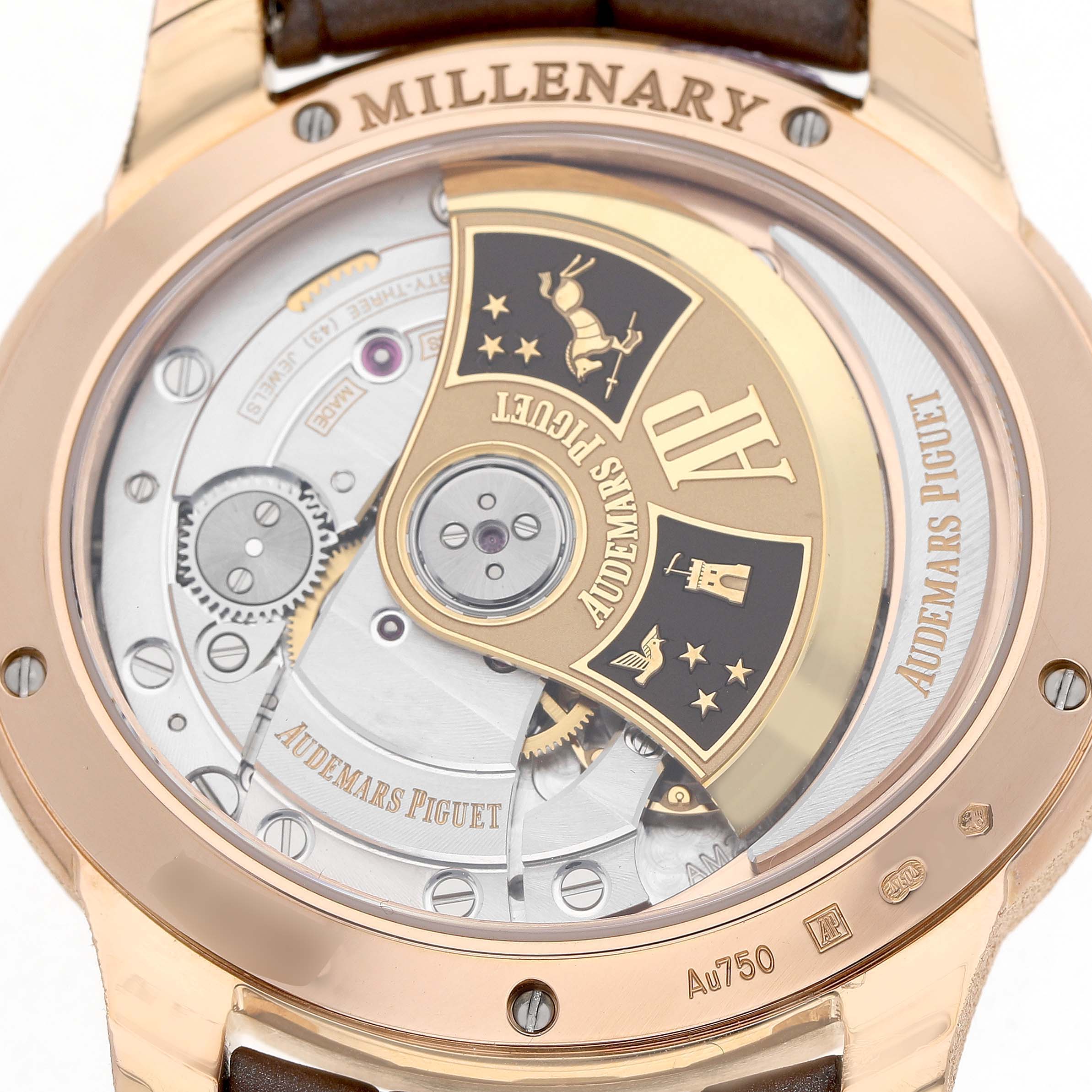 The image shows the back view of an Audemars Piguet Millenary 77266OR Women's Rose Gold Brown Dial watch, displaying its detailed movement and rotor.
