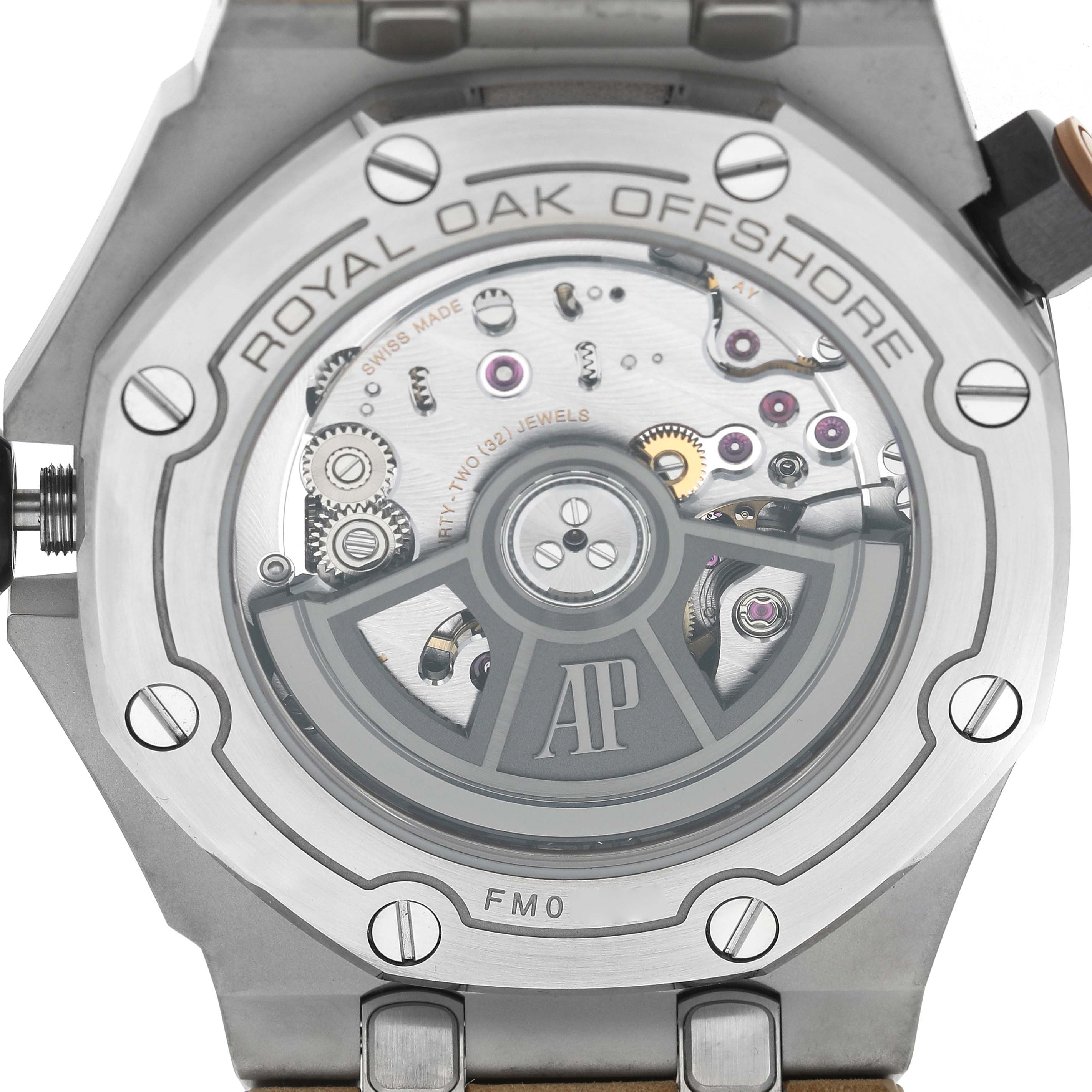 The image shows the back of an Audemars Piguet Royal Oak Offshore 15720ST Men's Stainless Steel Green Dial, highlighting its movement and caseback details.