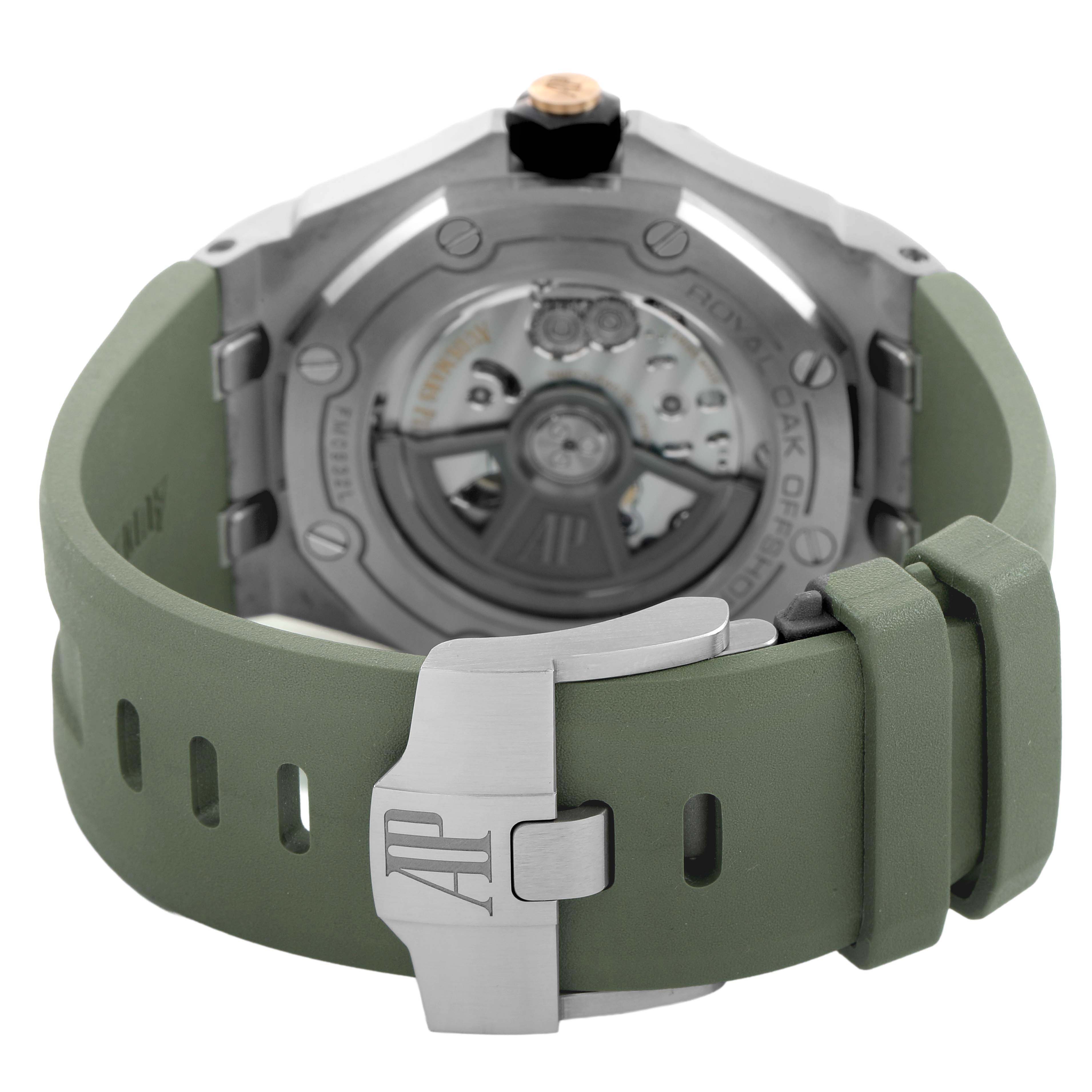 The image shows the back view of the Royal Oak Offshore model by Audemars Piguet, highlighting the movement and green strap with a clasp.