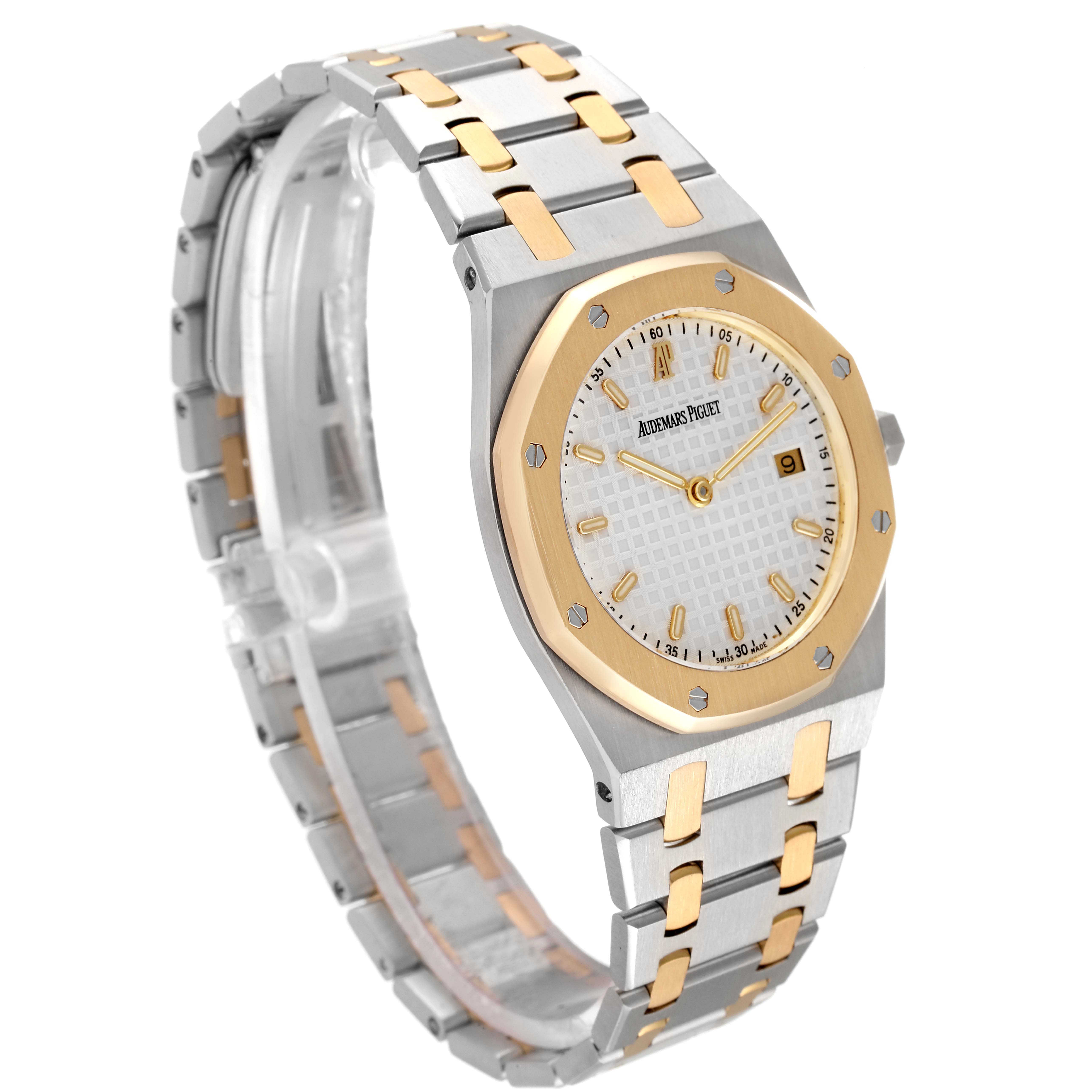 This image shows an angled view of the Audemars Piguet Royal Oak 56175SA.OO.0789SA.09 Men's Steel and Gold (two tone) Silver Dial 56175SA.OO.0789SA.09 Men's Steel and Gold (two tone) Silver Dial watch, highlighting its steel and gold case and bracelet.