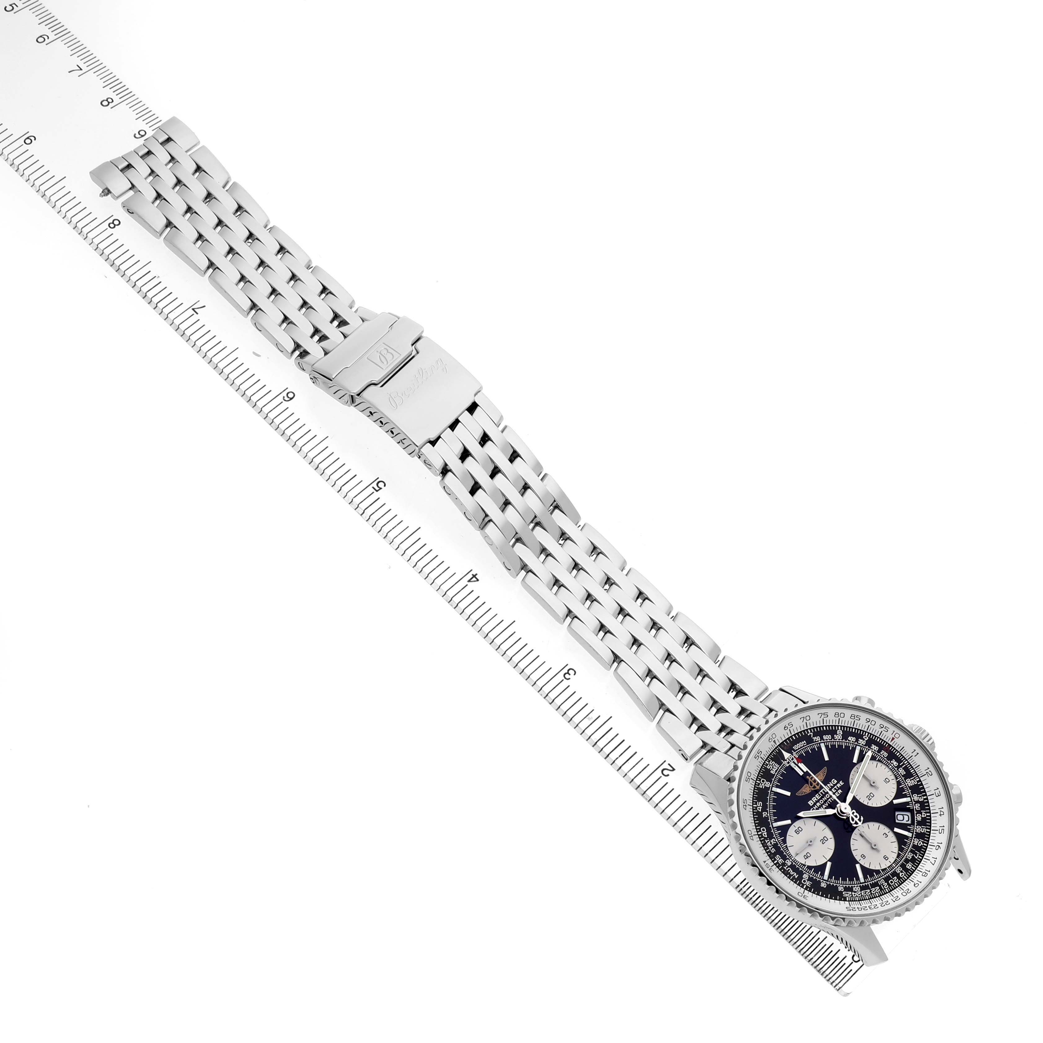 The image shows a top-down view of a Breitling Navitimer A23322 Men's Stainless Steel Black Dial watch, displaying the face, bezel, and full metal bracelet with a clasp.