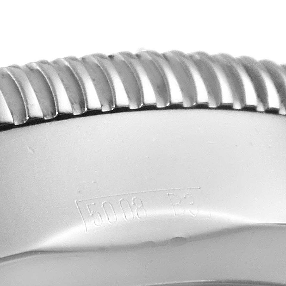 The image shows a close-up of the bezel and part of the case back of a Breitling Superocean A17320 Men's Stainless Steel Black Dial A17320 Men's Stainless Steel Black Dial watch.