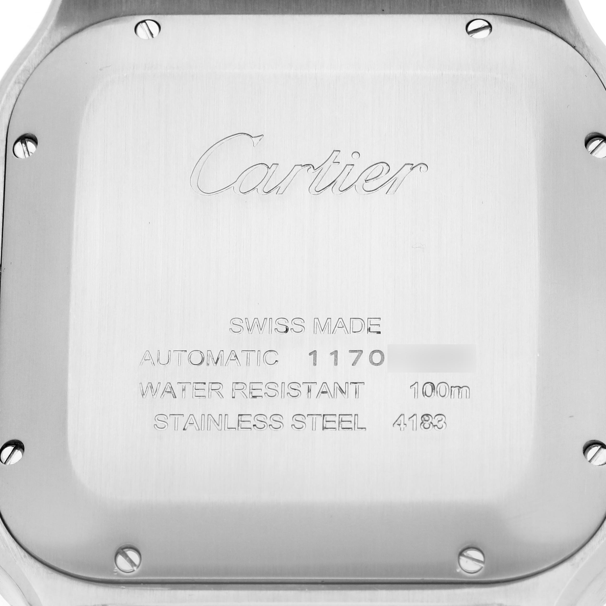 The image shows the back of a Cartier Santos WSSA0017 Men
s Stainless Steel Silver Dial WSSA0017 Men
s Stainless Steel Silver Dial watch case featuring engraved details and screws.