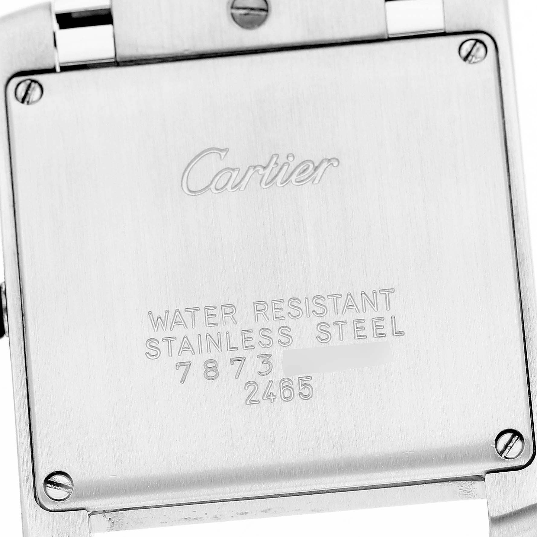 The image shows the back case of a Cartier Tank Francaise W51011Q3 Women's Stainless Steel Silver Dial watch, highlighting the model information and material details.