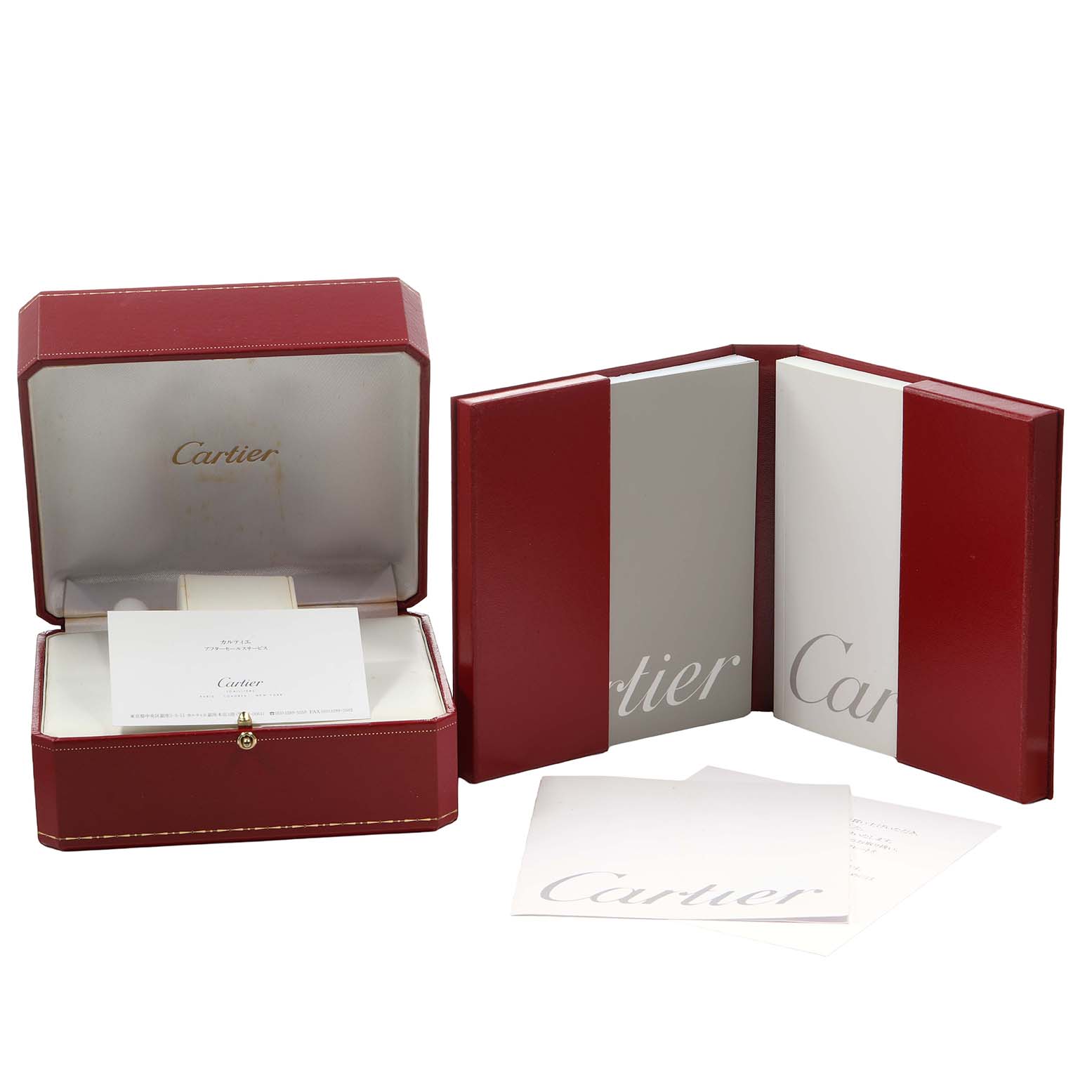 The image shows a Cartier Tank Francaise W51011Q3 Women's Stainless Steel Silver Dial watch box, booklets, and papers, viewed from the top angle.
