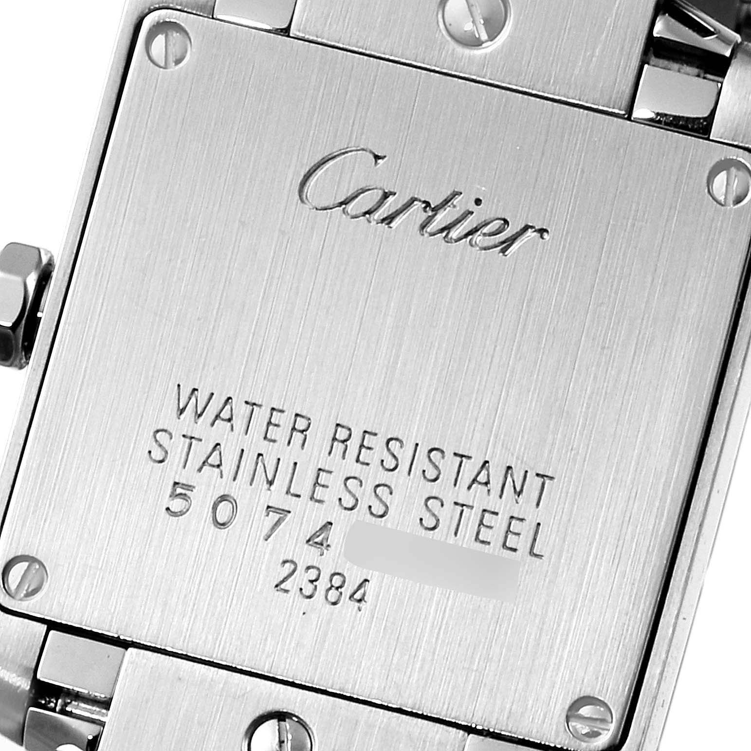 This image shows the back of a Cartier Tank Francaise W51028Q3 Women's Stainless Steel Mother of Pearl Dial W51028Q3 Women's Stainless Steel Mother of Pearl Dial watch, highlighting the engraved brand, water resistance info, and serial number.
