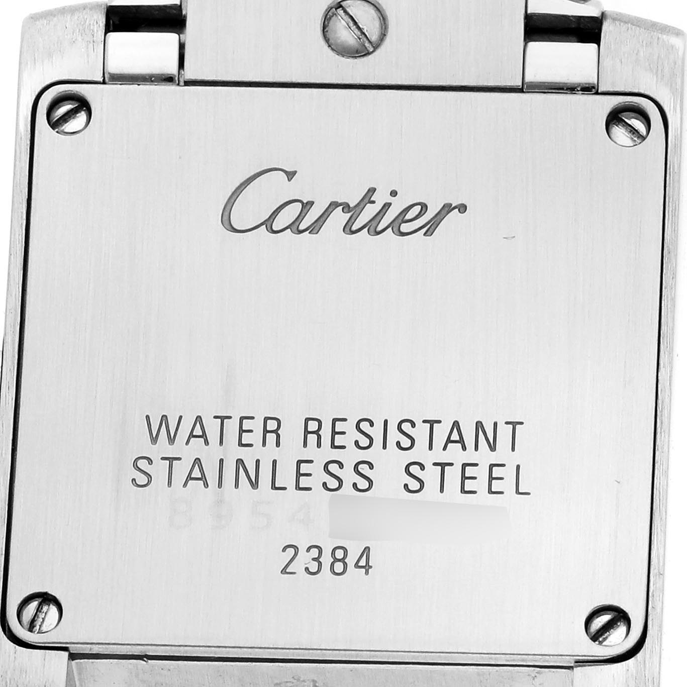 The image shows the back case of the Cartier Tank Francaise W51027Q4 Women's Steel and Gold (two tone) Mother of Pearl Dial W51027Q4 Women's Steel and Gold (two tone) Mother of Pearl Dial watch with engravings on water resistance and stainless steel material.