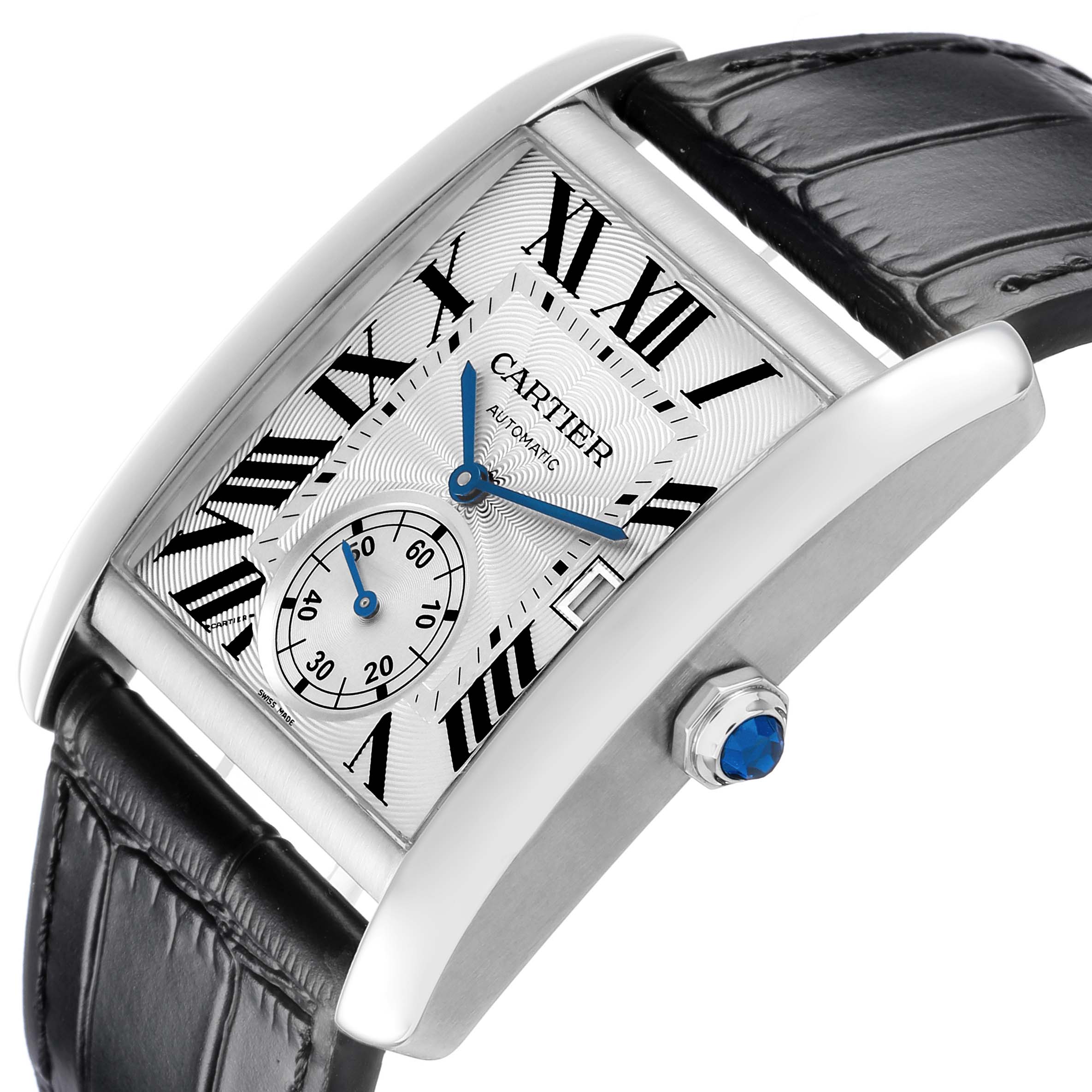The Cartier Tank MC W5330003 Men's Stainless Steel Silver Dial watch is shown at an angled view, highlighting its dial, Roman numerals, sub-dial, and crown with blue gem.