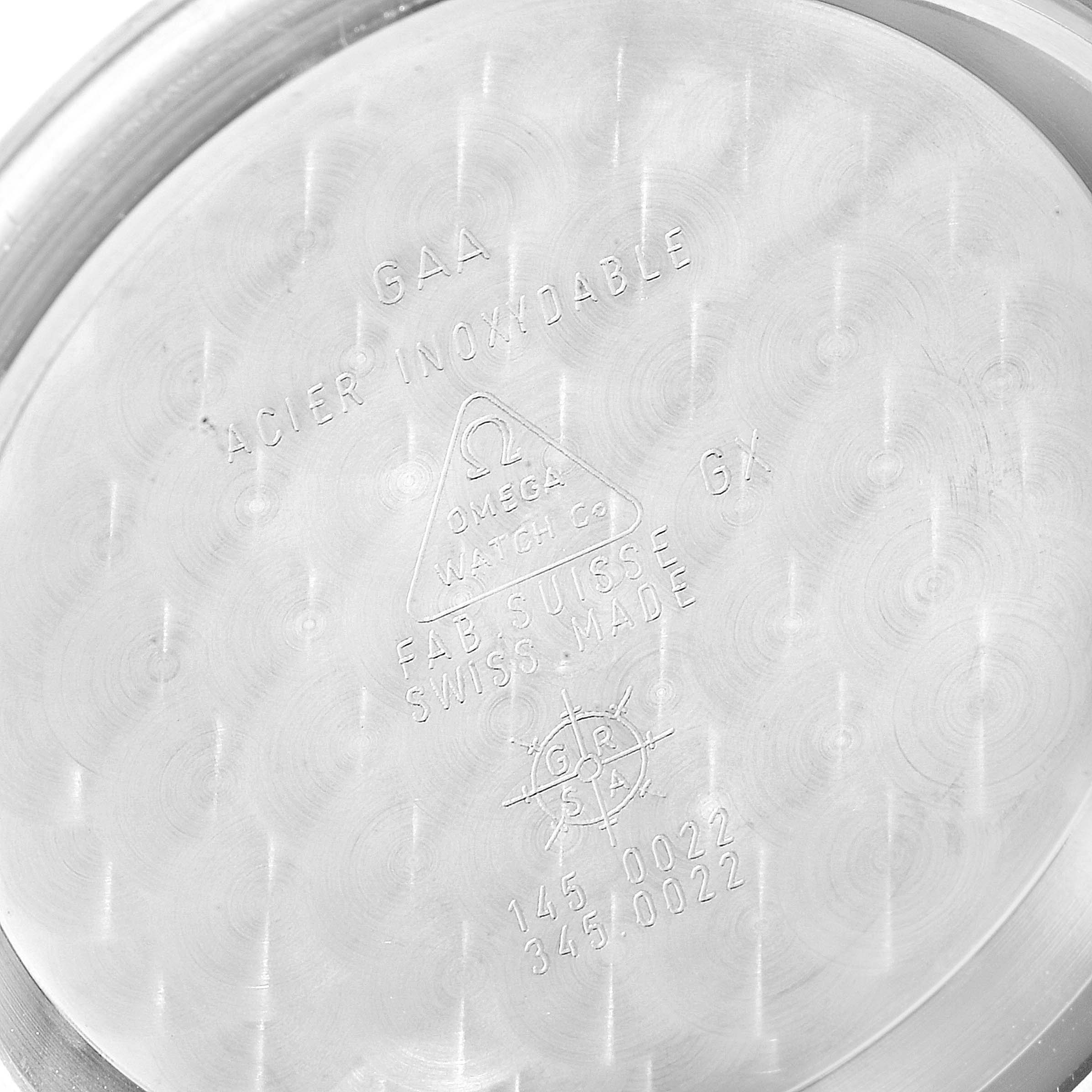 This image shows the inner case back of an Omega Speedmaster 3570.50.00  Men
s Stainless Steel Black Dial 3570.50.00  Men
s Stainless Steel Black Dial watch, displaying engraved details and model numbers.