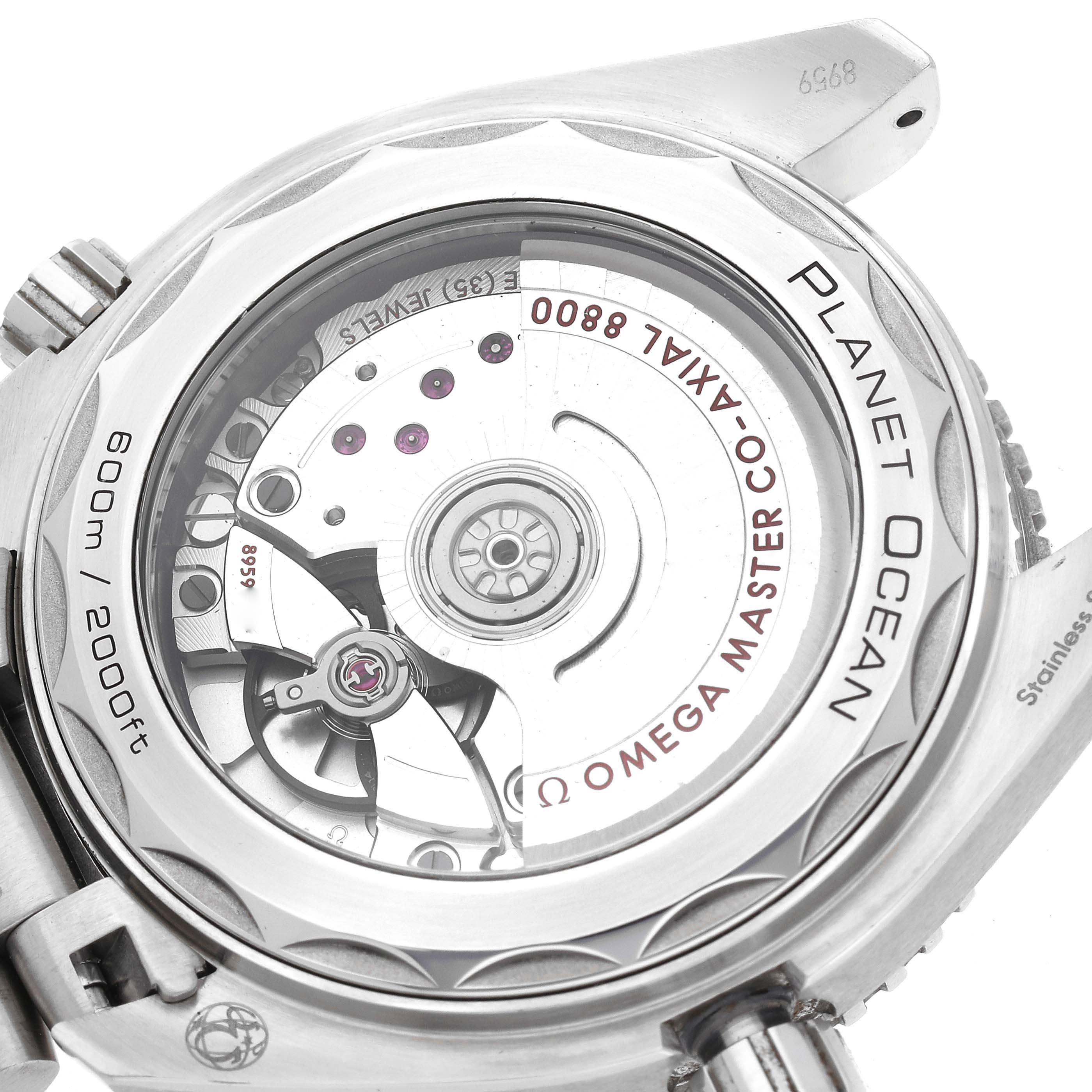 The image shows the back of the Omega Planet Ocean 215.30.40.20.01.001 Men
s Stainless Steel Black Dial 215.30.40.20.01.001 Men
s Stainless Steel Black Dial watch, highlighting the movement and transparent case back.