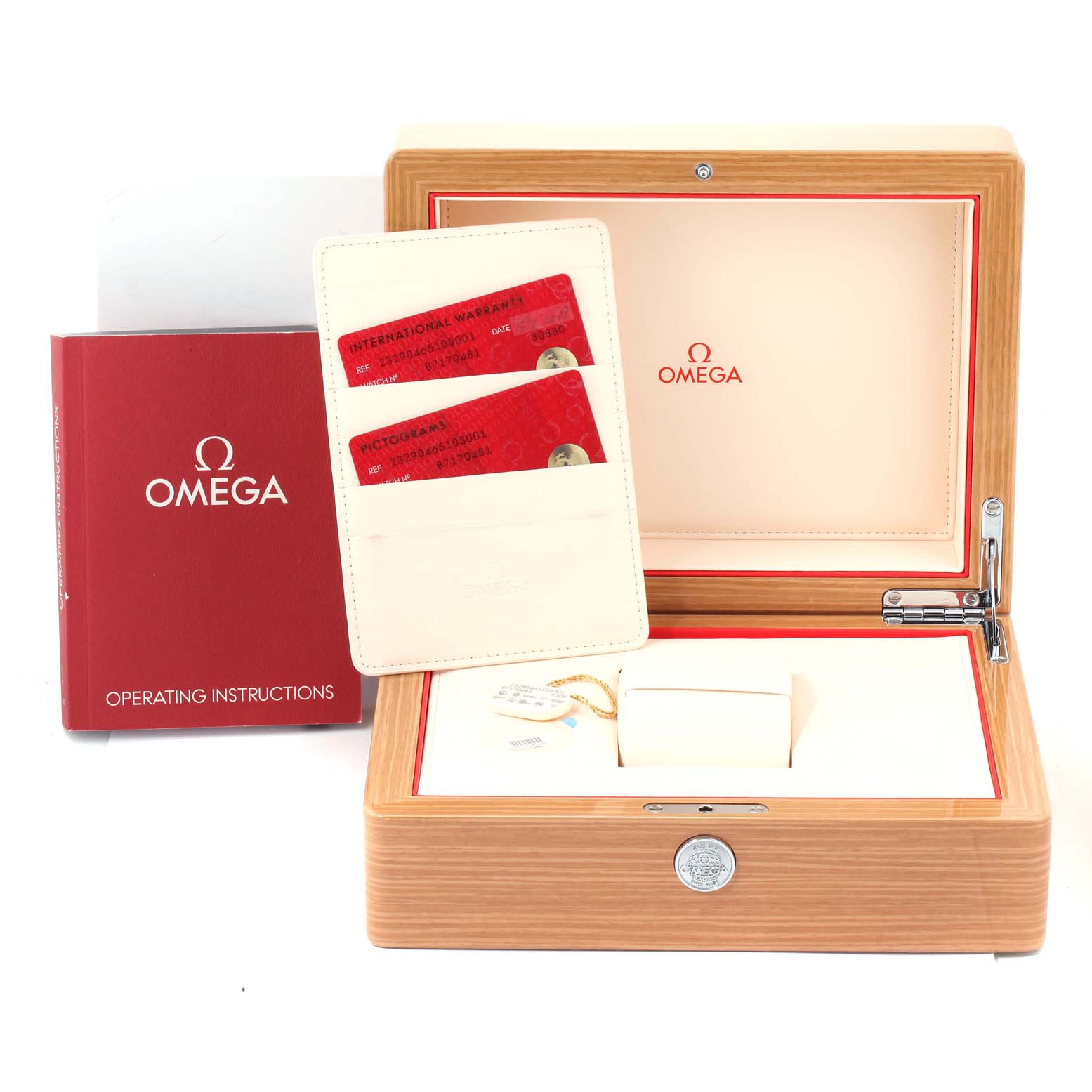 This image shows the open box, warranty cards, and instruction manual for the Omega Planet Ocean 232.90.46.51.03.001 Men's Titanium Blue Dial 232.90.46.51.03.001 Men's Titanium Blue Dial model watch.