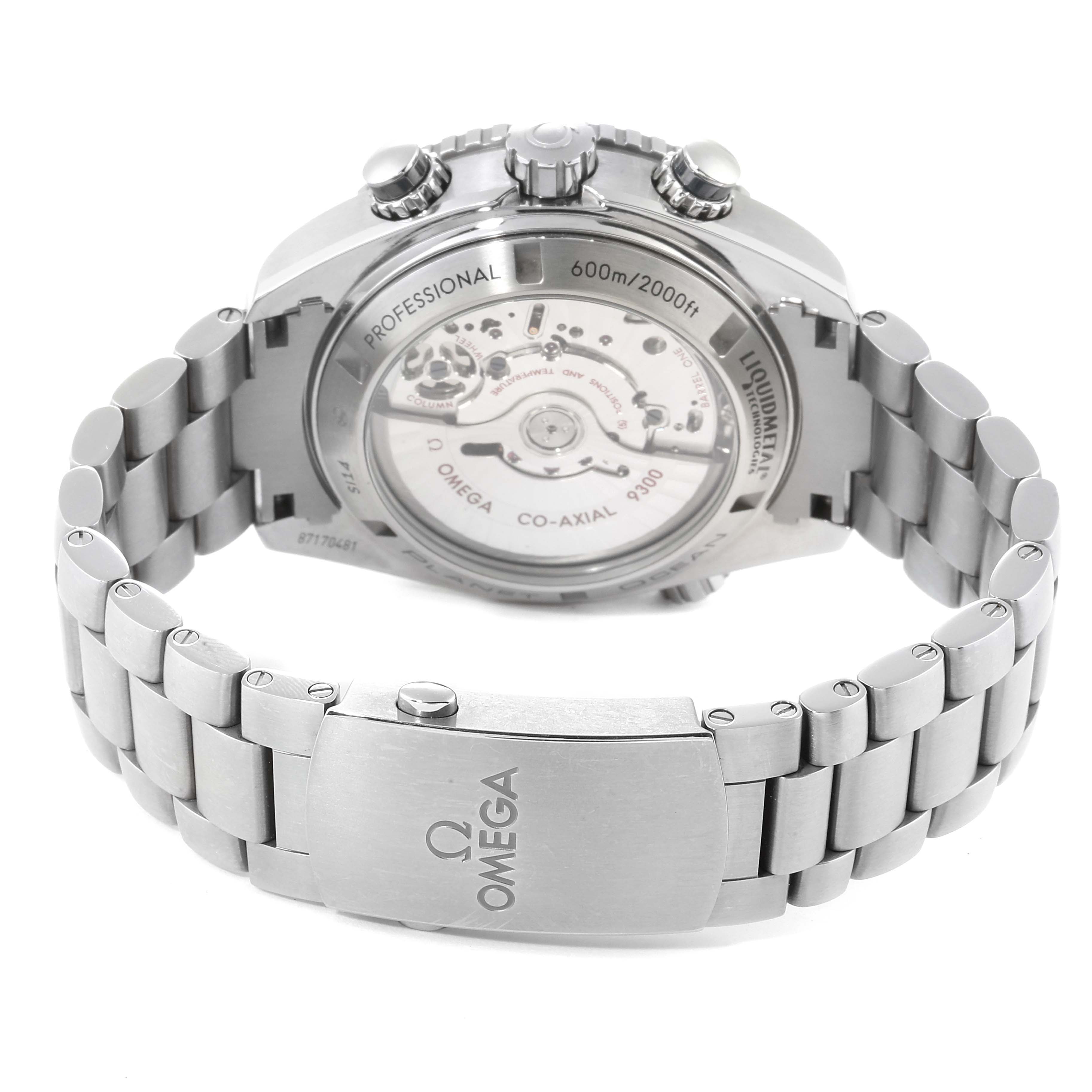 The image shows the back view of an Omega Planet Ocean 232.90.46.51.03.001 Men's Titanium Blue Dial 232.90.46.51.03.001 Men's Titanium Blue Dial watch, highlighting the transparent case back and metal bracelet.