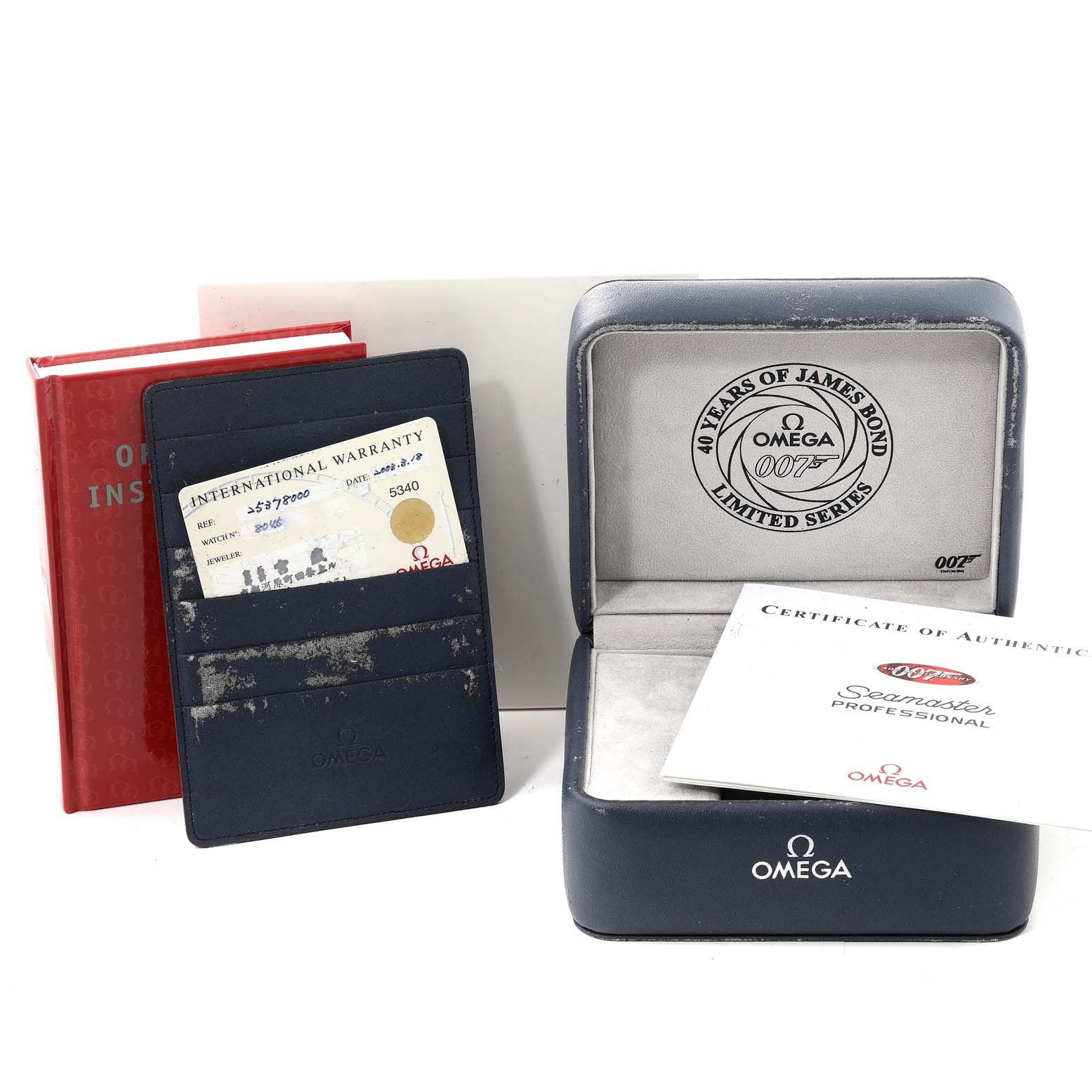 The image shows an Omega Seamaster 2537.80.00 Men's Stainless Steel Blue Dial 2537.80.00 Men's Stainless Steel Blue Dial watch case, warranty card, certificate of authenticity, and instruction booklet.