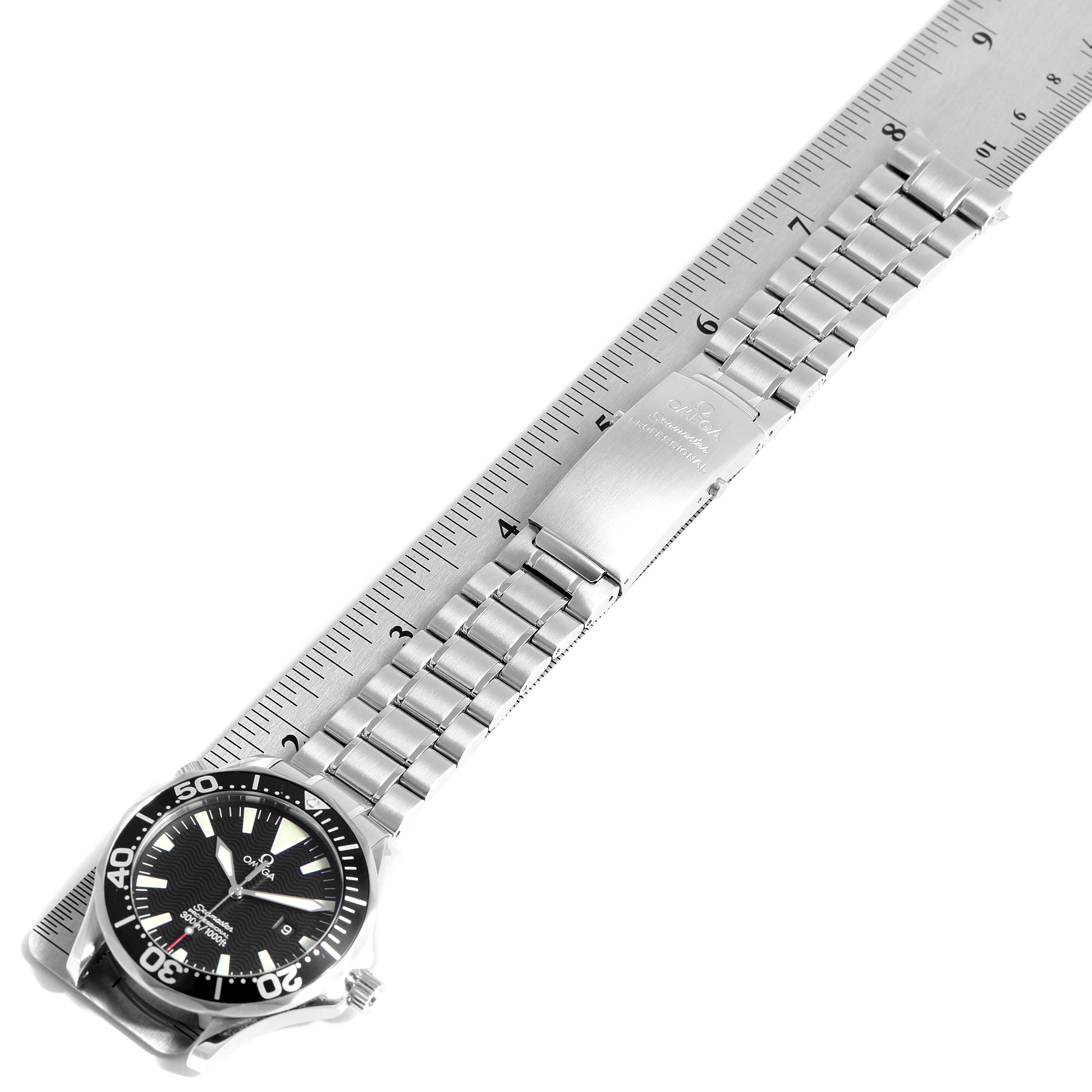 The image shows an Omega Seamaster 2264.50.00 Men
s Stainless Steel Black Dial 2264.50.00 Men
s Stainless Steel Black Dial watch laid flat, highlighting the dial, bezel, and metal bracelet with clasp.