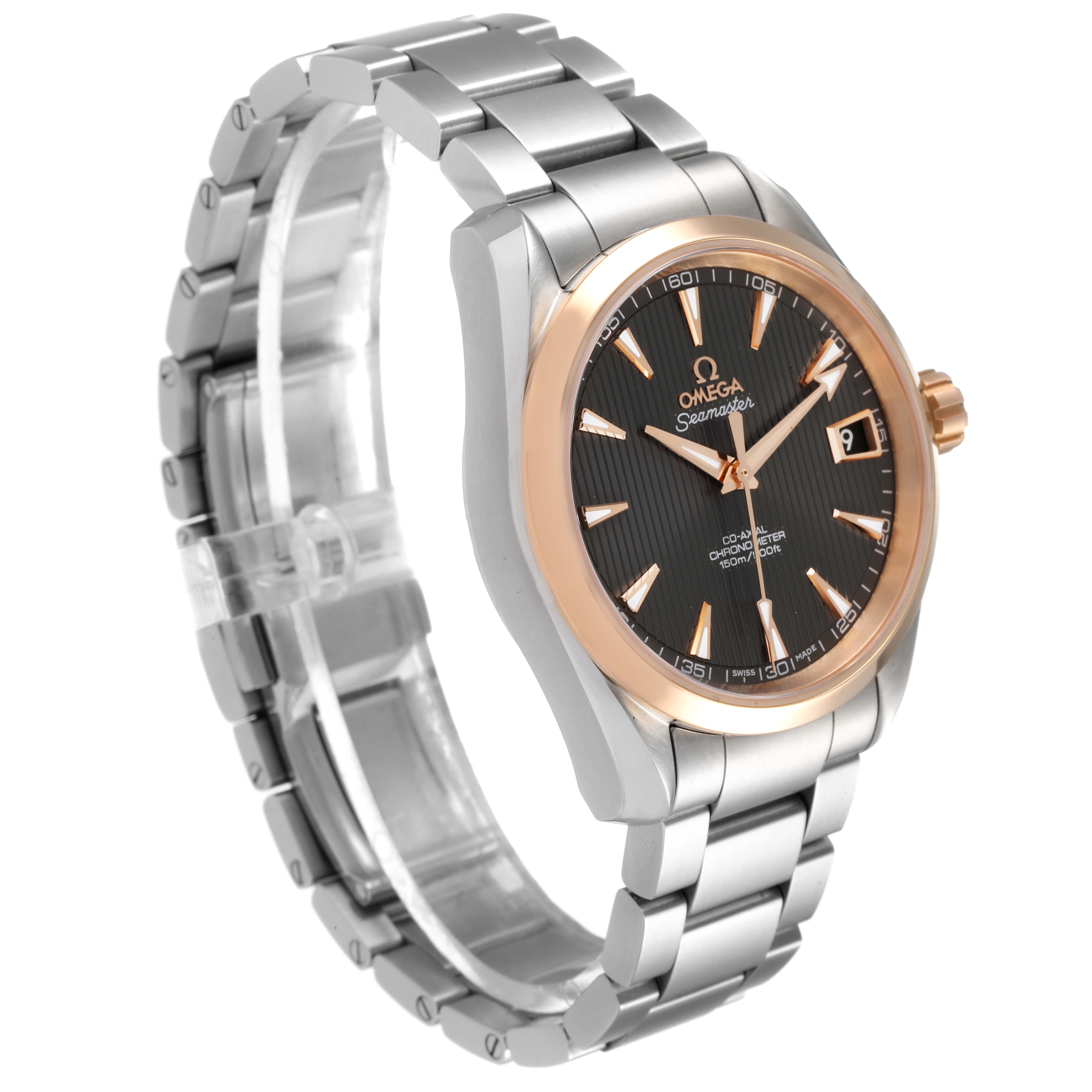 This is a side angle view of the Omega Aqua Terra 231.20.39.21.06.003 Men
s Steel and Gold (two tone) Grey Dial 231.20.39.21.06.003 Men
s Steel and Gold (two tone) Grey Dial watch showing the face, bezel, bracelet, and crown.