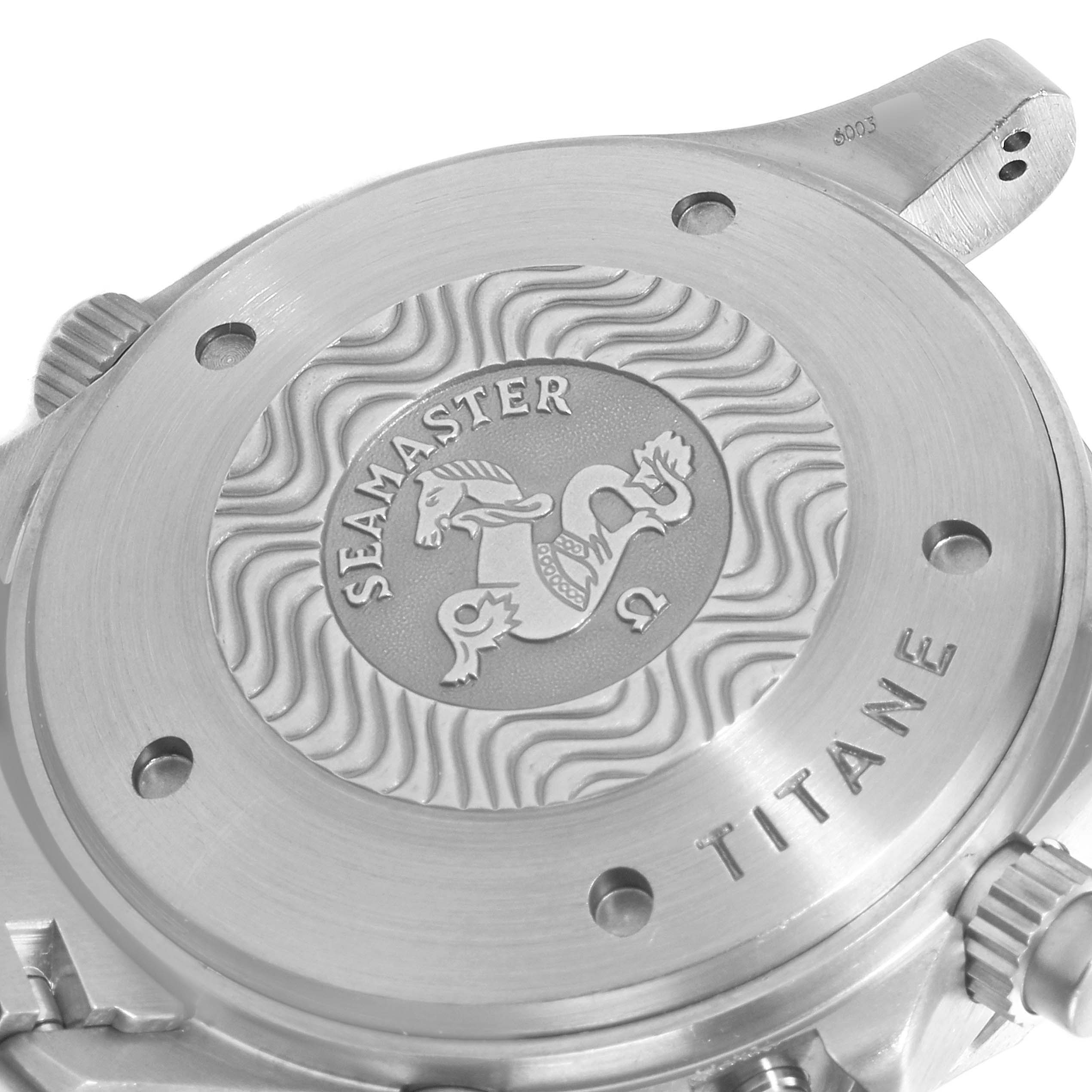 This image shows the case back of an Omega Seamaster 2298.80.00 Men
s Titanium Blue Dial 2298.80.00 Men
s Titanium Blue Dial watch, highlighting the engraved Seamaster logo and "TITANE" inscription.