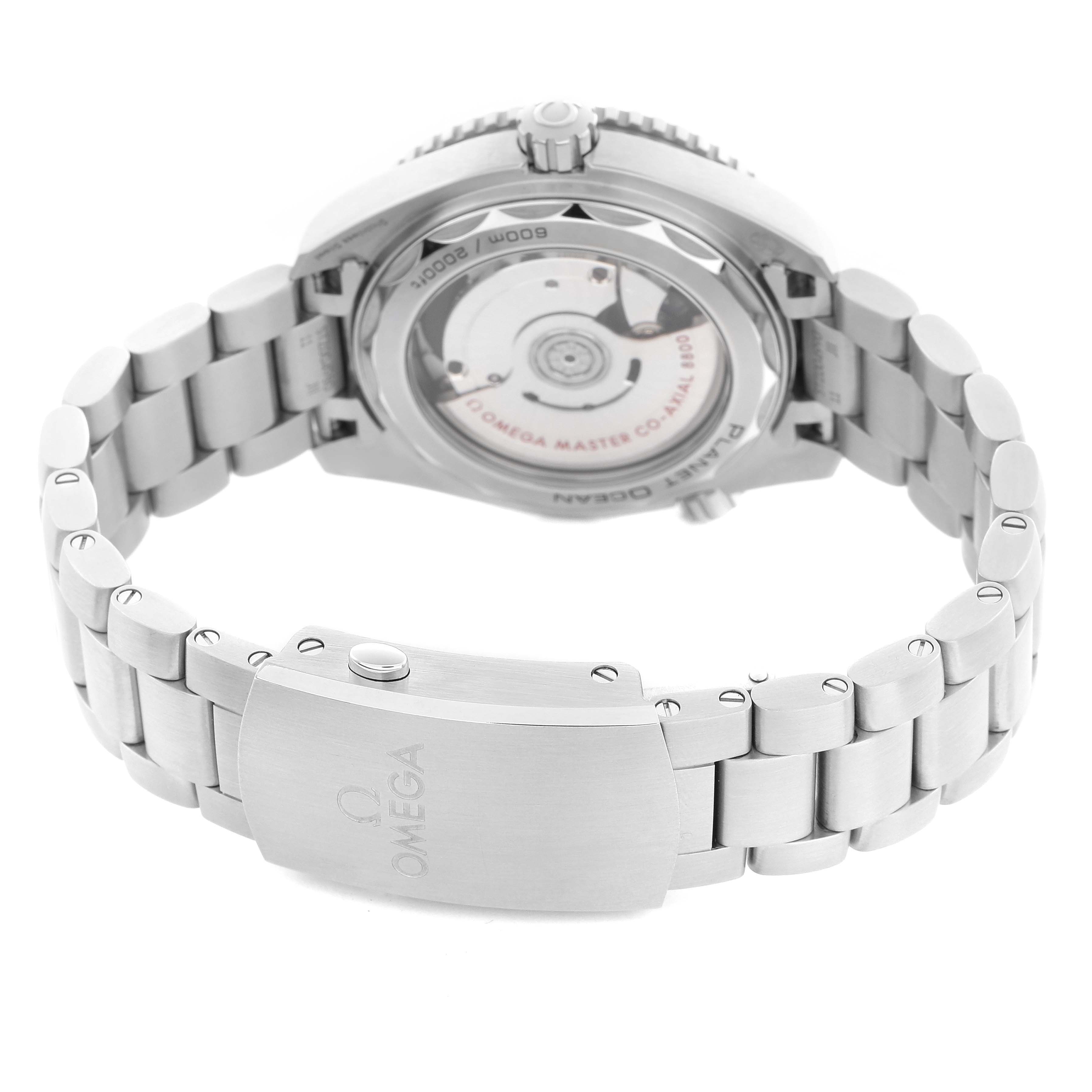 The image shows the Omega Planet Ocean 215.30.40.20.04.001 Men
s Stainless Steel White Dial 215.30.40.20.04.001 Men
s Stainless Steel White Dial watch from the back, highlighting the mechanical movement and bracelet with the clasp.