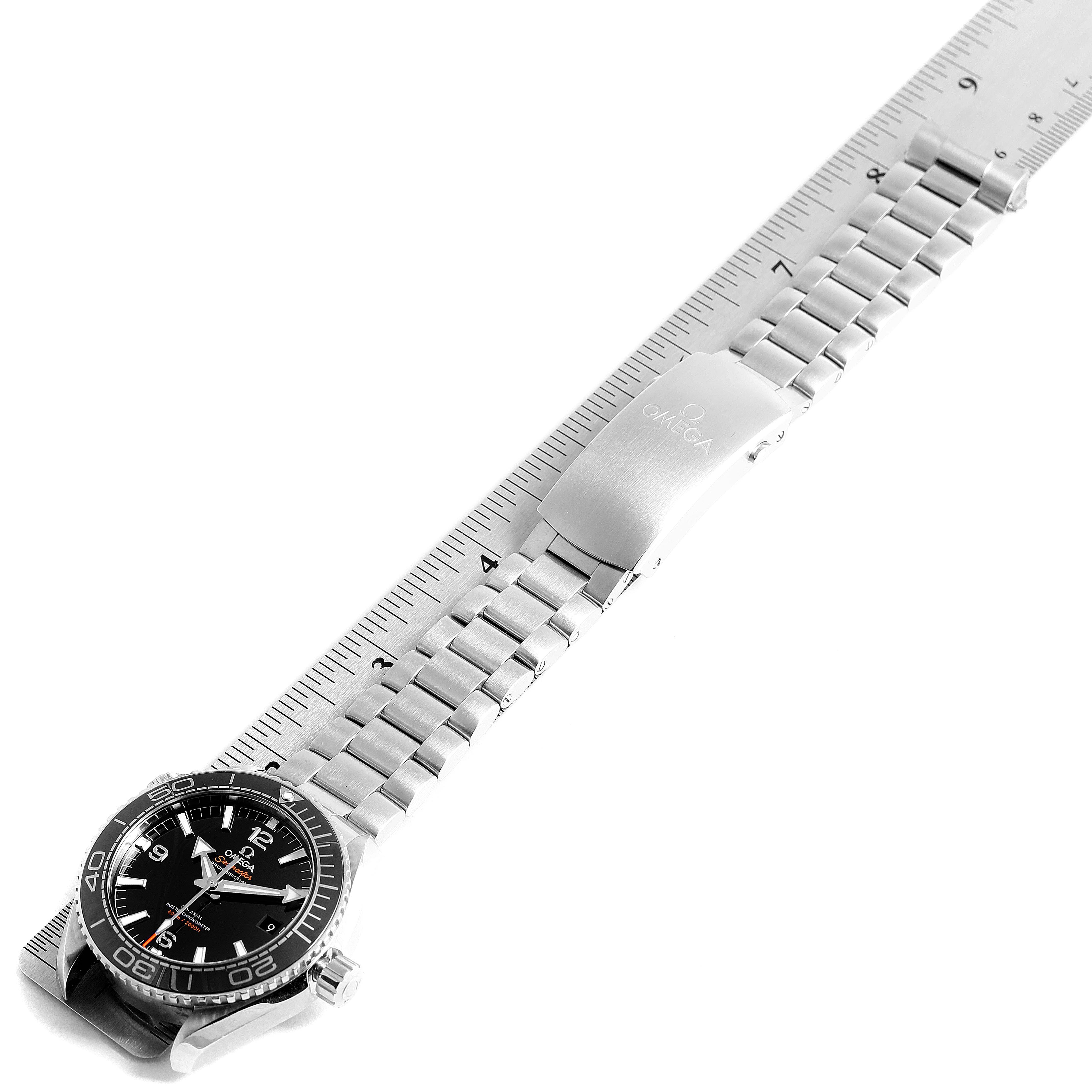 The photo shows the Omega Planet Ocean 215.30.44.21.01.001 Men
s Stainless Steel Black Dial 215.30.44.21.01.001 Men
s Stainless Steel Black Dial watch from an oblique top view, highlighting the metal bracelet and clasp.