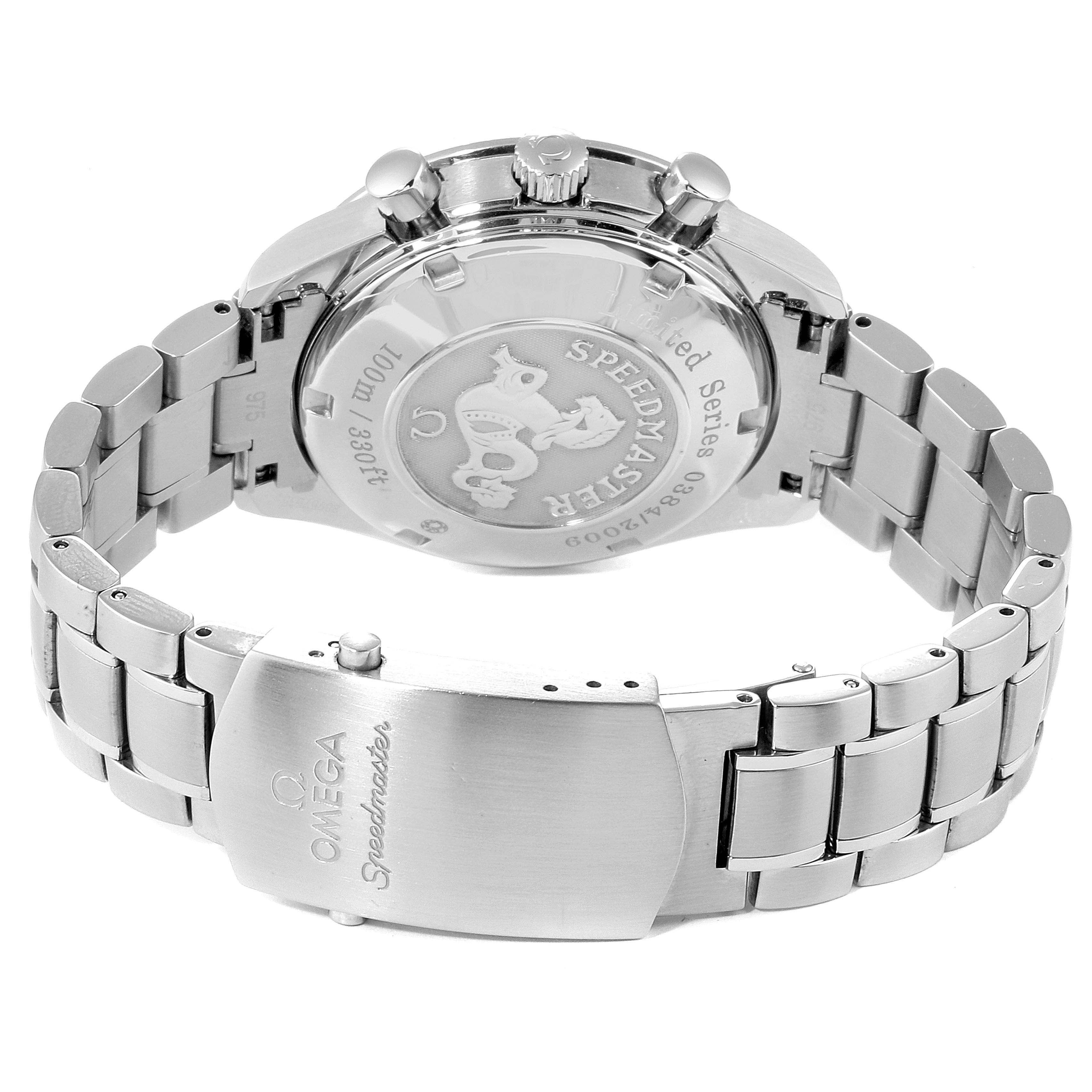 The image shows the back case and bracelet of an Omega Speedmaster 323.30.40.40.01.001 Men
s Stainless Steel Black Dial 323.30.40.40.01.001 Men
s Stainless Steel Black Dial watch, featuring its engraved logo and clasp.