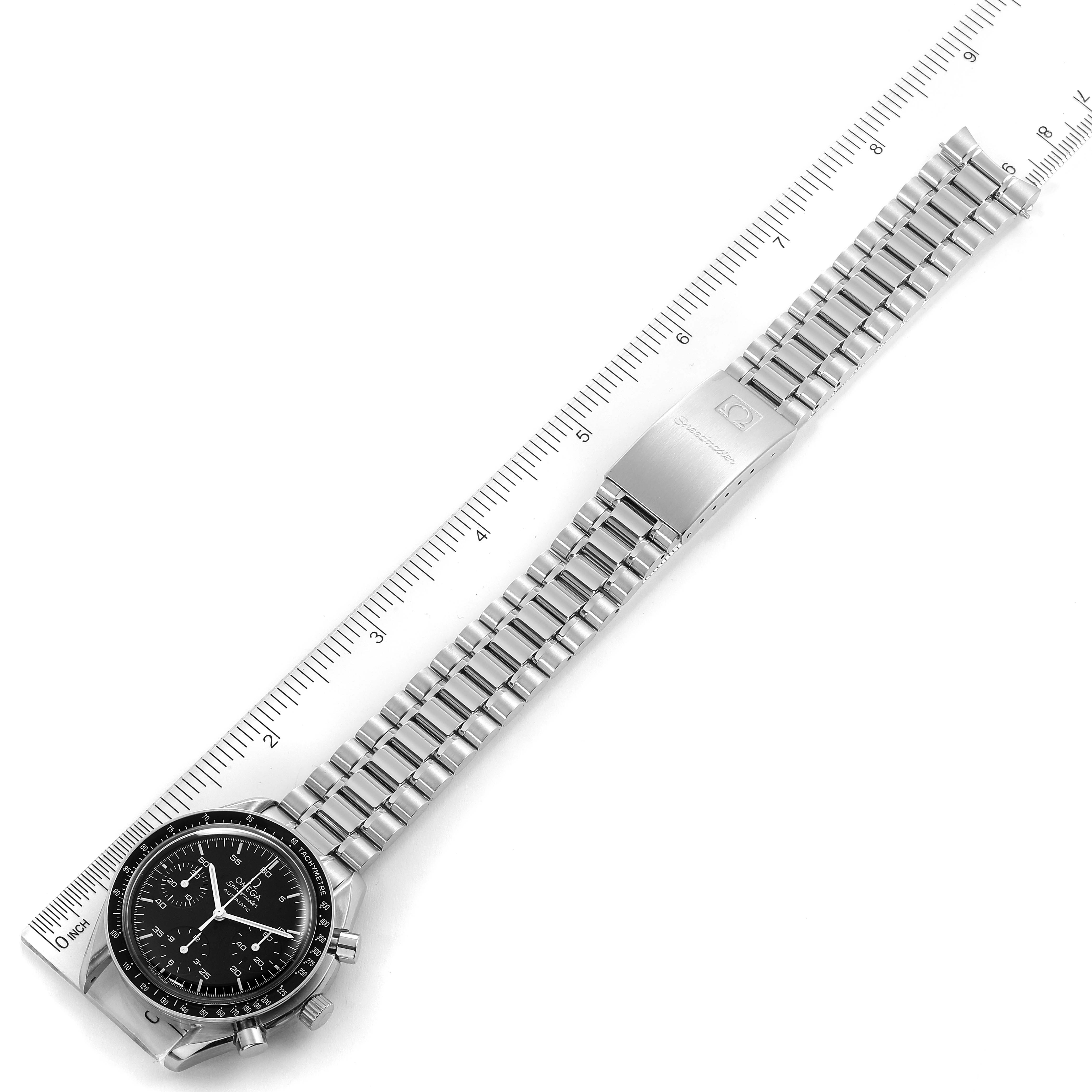The Omega Speedmaster 3510.50.00 Men
s Stainless Steel Black Dial 3510.50.00 Men
s Stainless Steel Black Dial watch is shown at an angle with the face, bracelet, and clasp visible alongside a ruler for sizing.