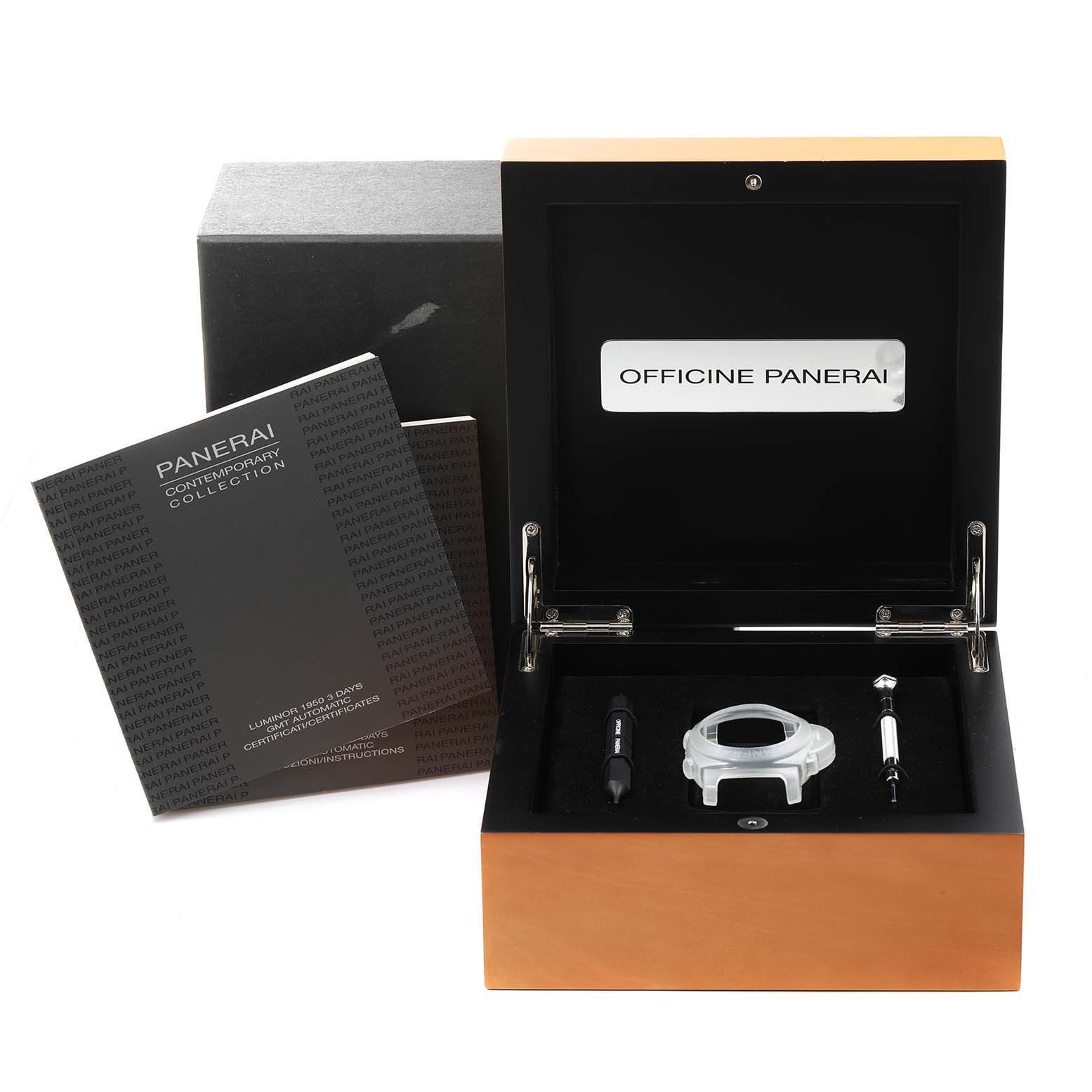 This image shows an open Panerai Luminor PAM00329 Men
s Stainless Steel Black Dial PAM00329 Men
s Stainless Steel Black Dial watch box from a top-down angle, displaying watch accessories and documentation.